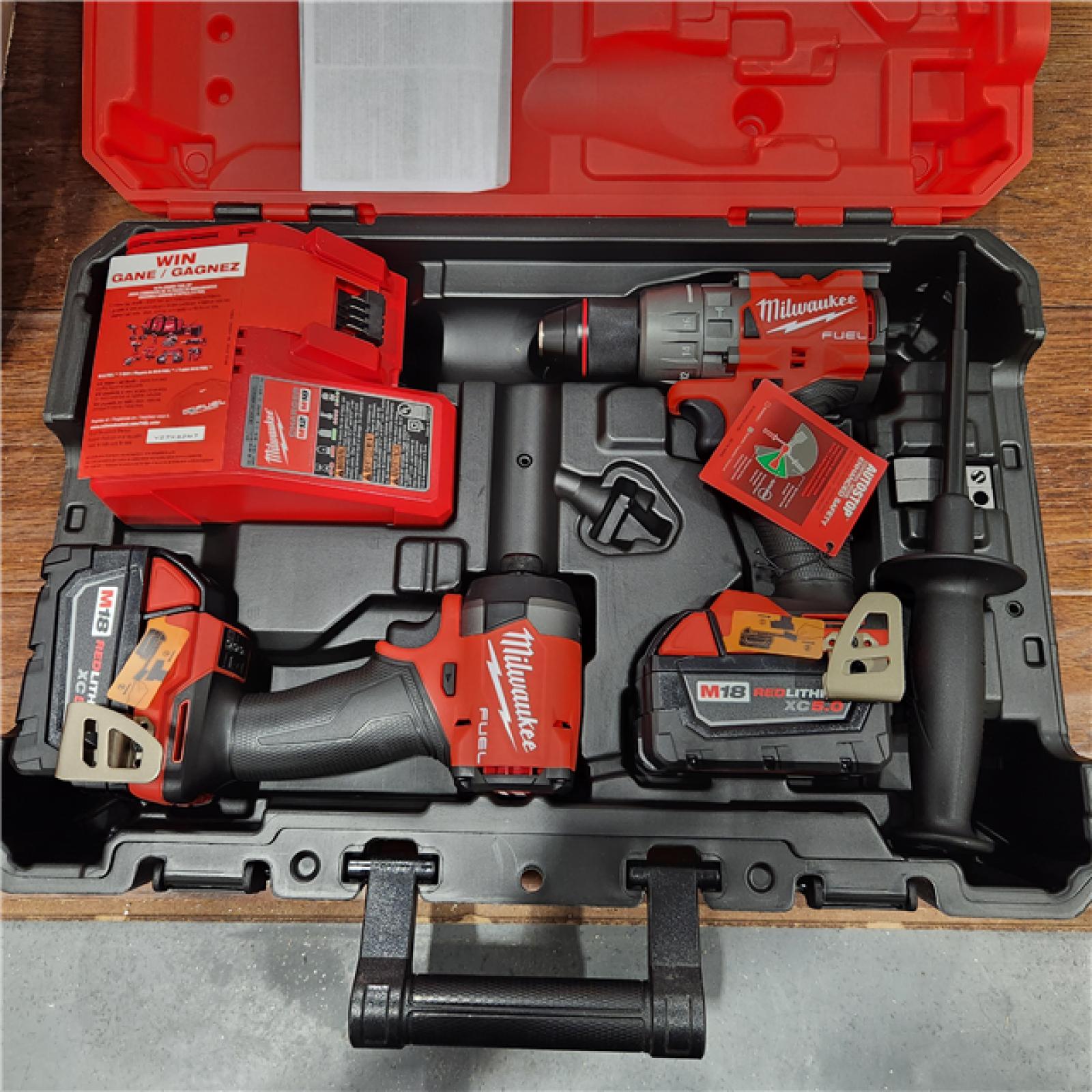 AS-IS M18 FUEL 18V Lithium-Ion Brushless Cordless Hammer Drill and Impact Driver Combo Kit (2-Tool) with 2 Batteries