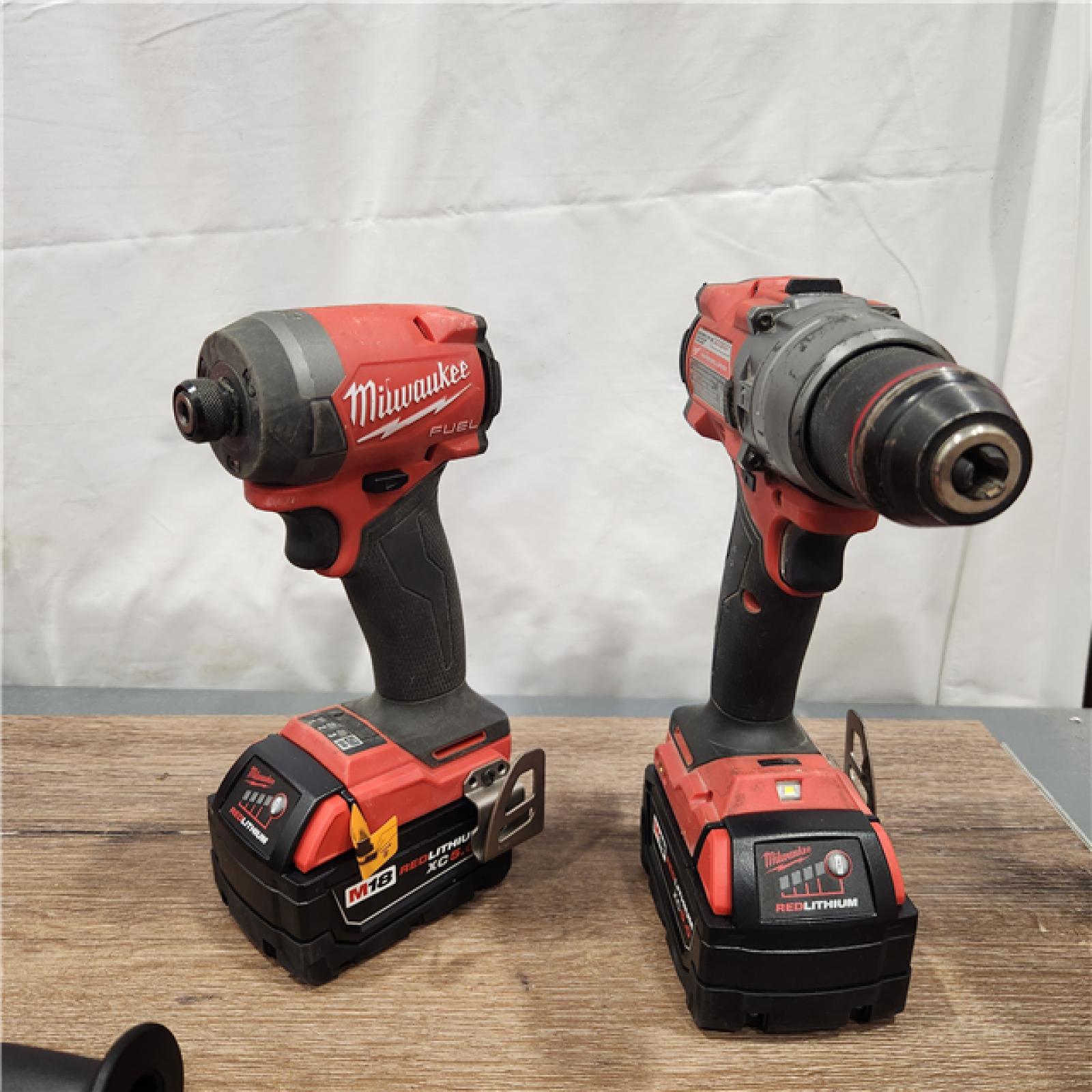 AS-IS Milwaukee M18 FUEL 18V Lithium-Ion Brushless Cordless Hammer Drill and Impact Driver Combo Kit (2-Tool) with 2 Batteries