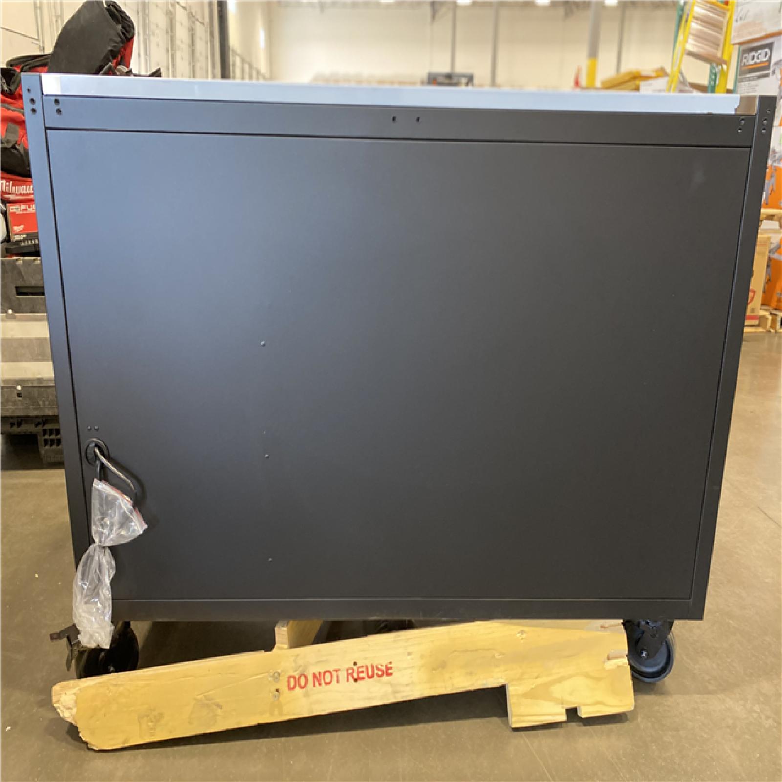 DALLAS LOCATION - Husky Modular Tool Storage 62 in. W X 24 in. D Heavy Duty Matte Black Mobile Workbench Cabinet with Stainless Steel Top