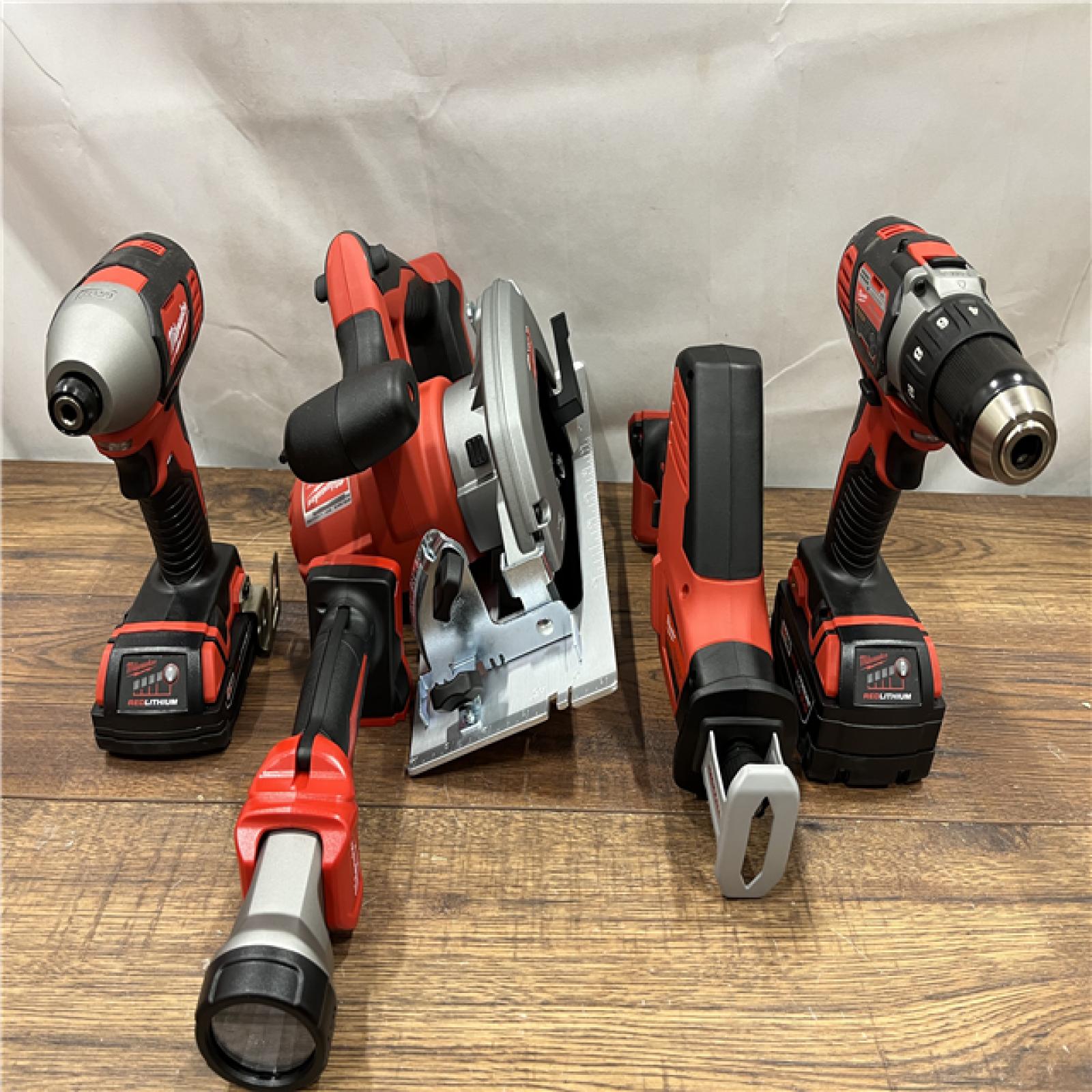 AS IS Milwaukee M18 18-Volt Lithium-Ion Cordless Combo Tool Kit (5-Tool) with (1) 3.0Ah and (1) 1.5Ah Battery, (1) Charger, (1) Tool Bag