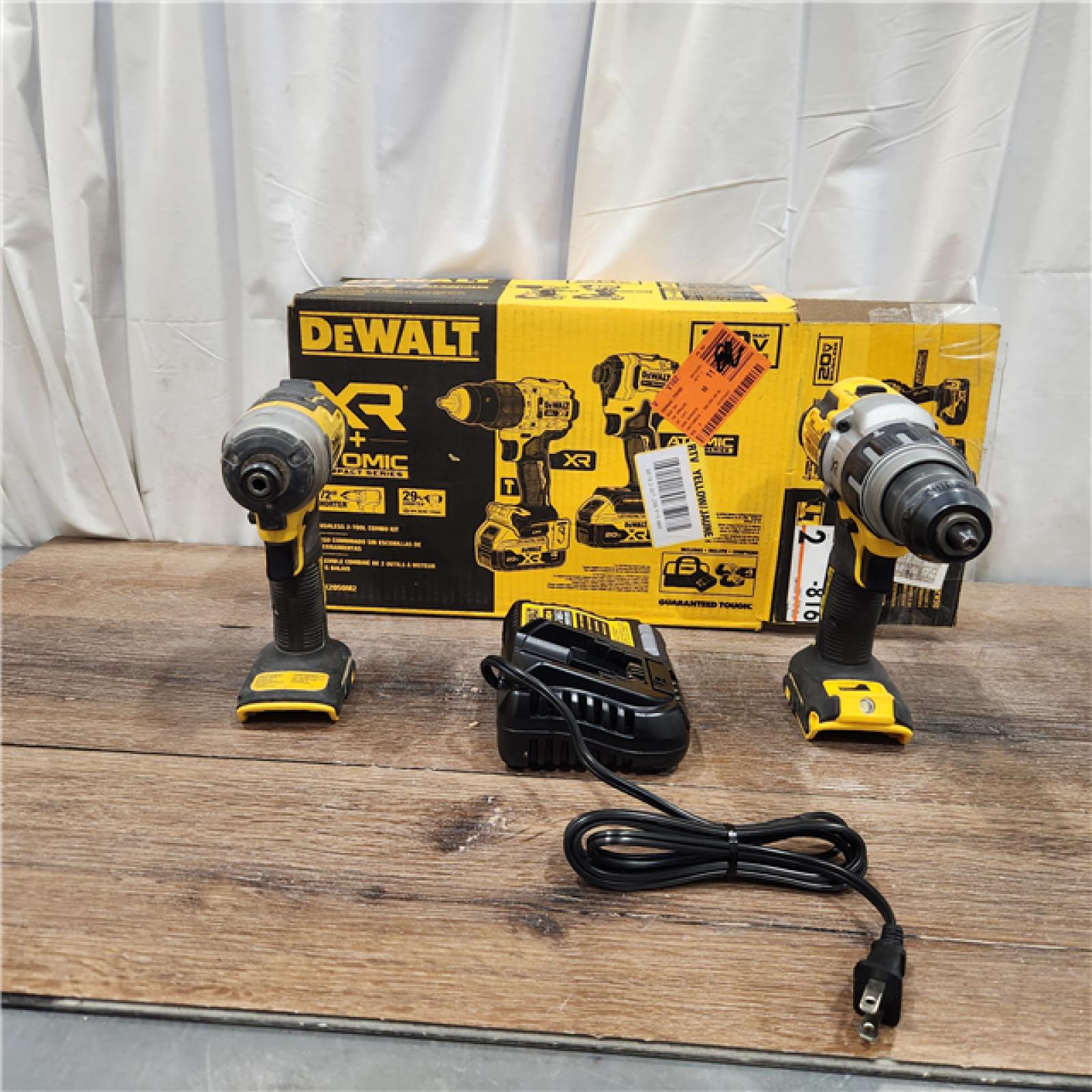 AS-IS DEWALT 20V MAX XR Hammer Drill and ATOMIC Impact Driver 2 Tool Cordless Combo Kit with (2) 4.0Ah Batteries, Charger, and Bag