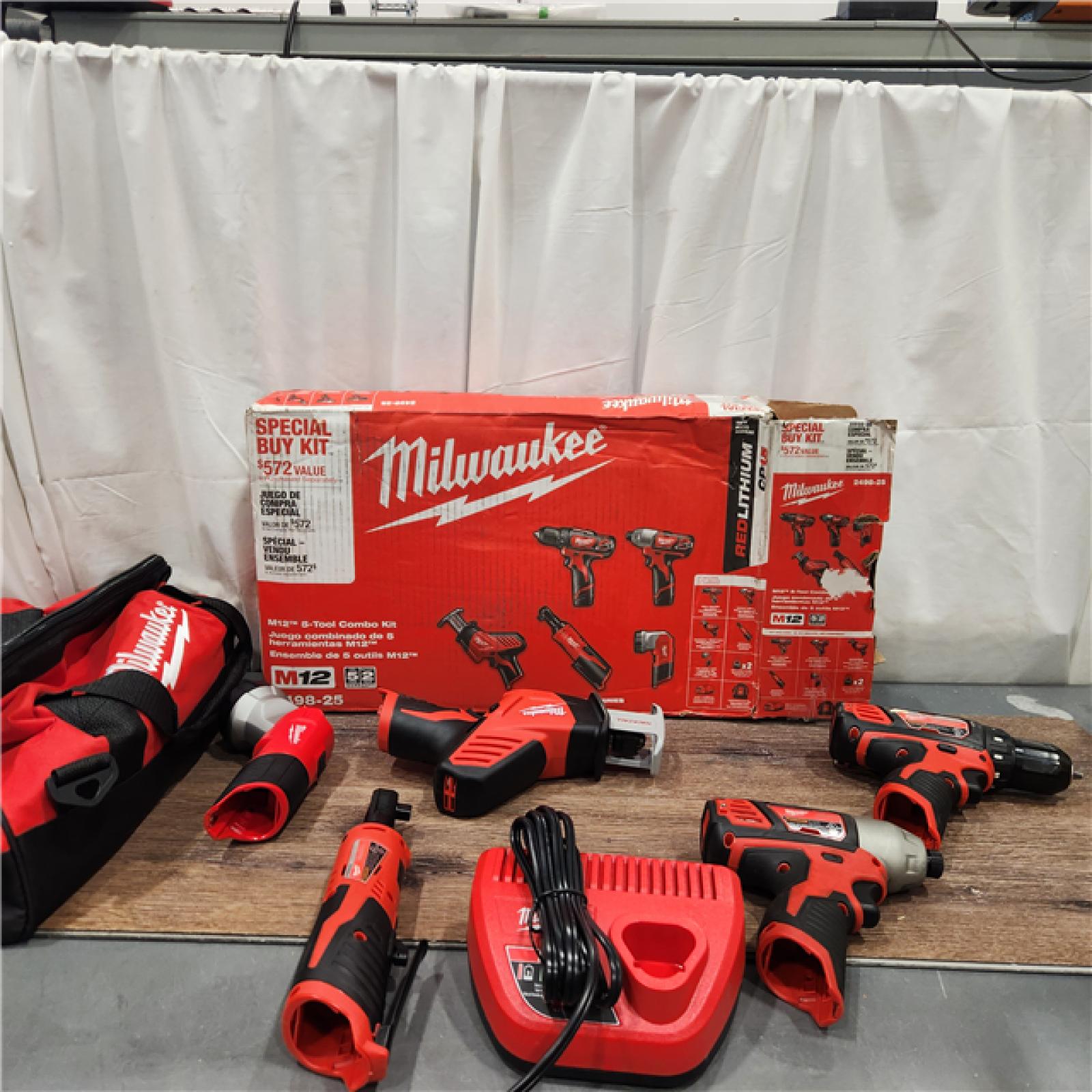 AS IS MILWAUKEE M12 12V Lithium-Ion Cordless Combo Kit (5-Tool) with Two 1.5Ah Batteries, Charger & Tool Bag