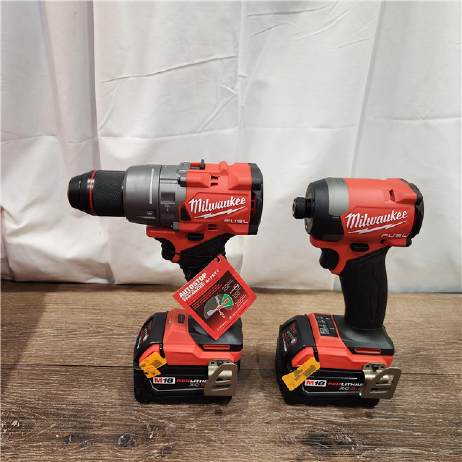 AS-IS Milwaukee M18 FUEL 18V Lithium-Ion Brushless Cordless Hammer Drill and Impact Driver Combo Kit (2-Tool) with 2 Batteries