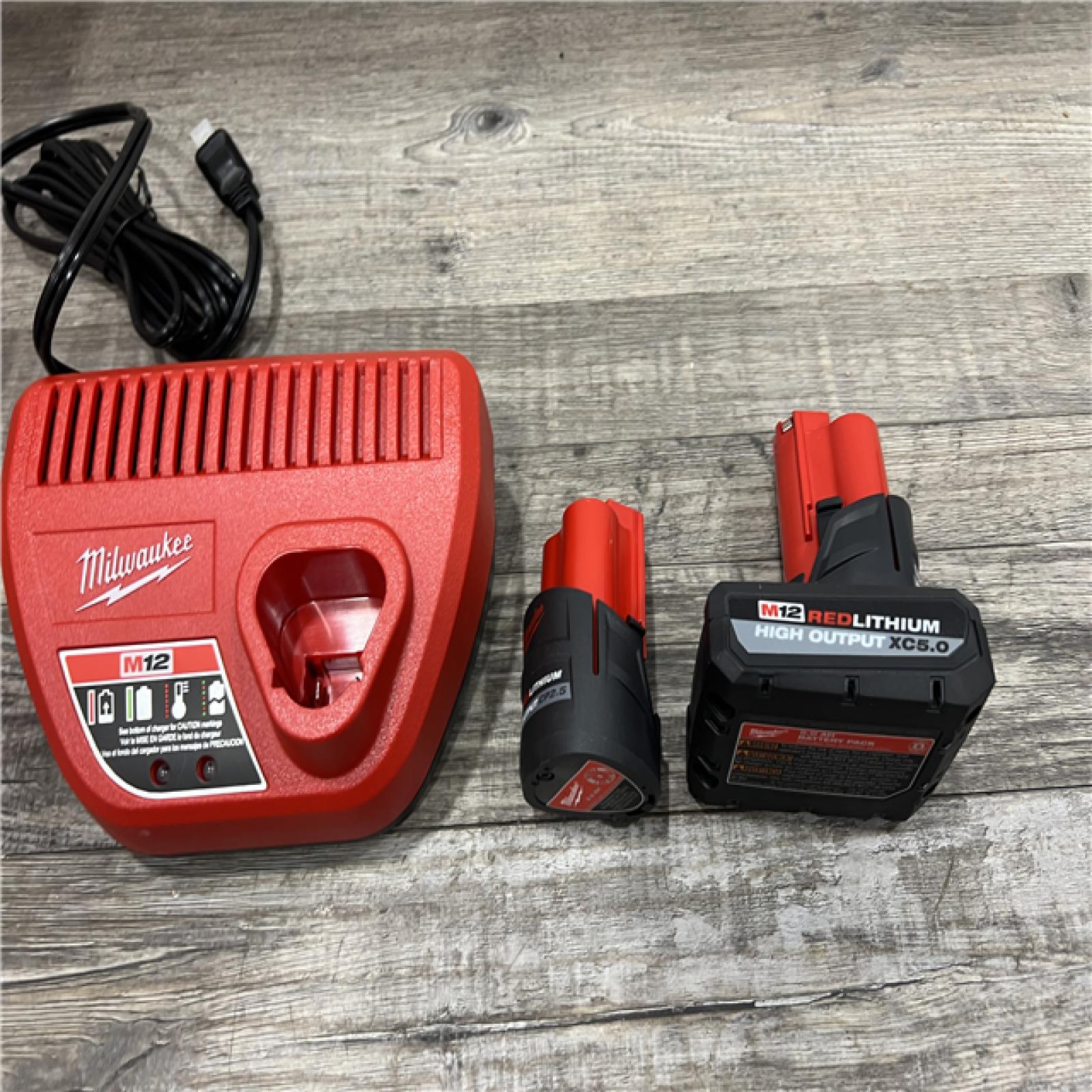 AS-IS Milwaukee M12 12-Volt Lithium-Ion High Output 5.0 Ah and 2.5 Ah Battery Packs and Charger Starter Kit (48-59-2452S)