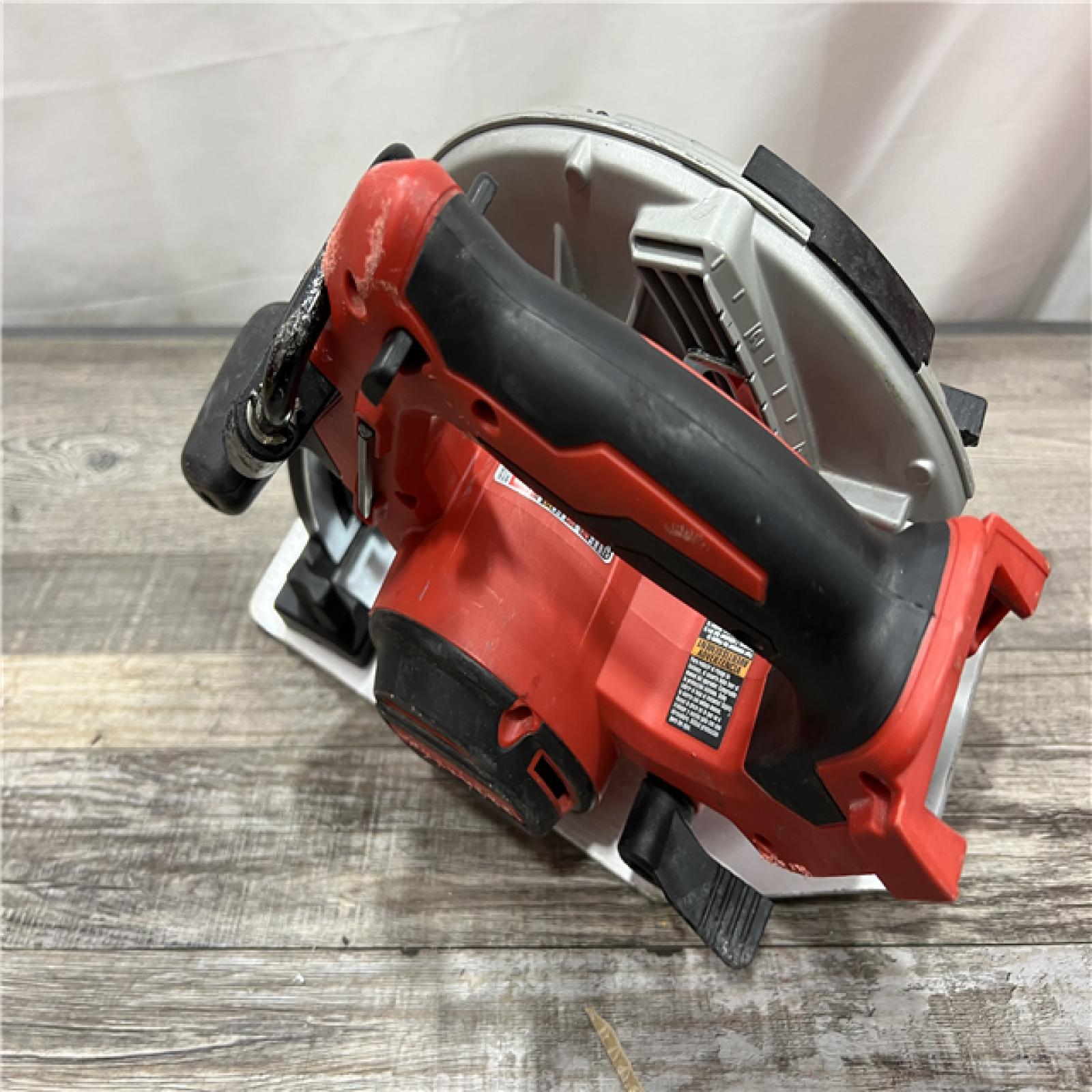 AS-IS Milwaukee M18 FUEL 18V Lithium-Ion Brushless Cordless 7-1/4 in. Circular Saw (Tool-Only)