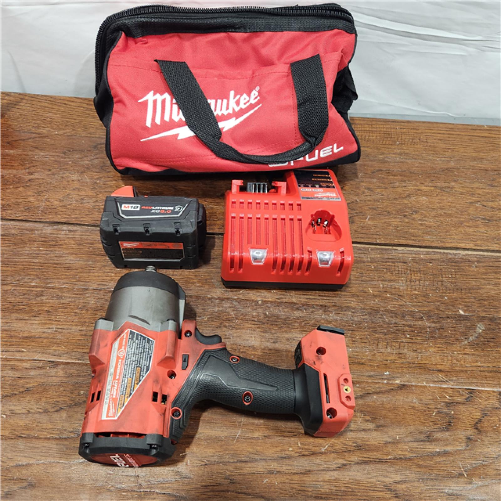 AS-IS Milwaukee M18 FUEL 1/2 High Torque Impact Wrench with Friction Ring Kit