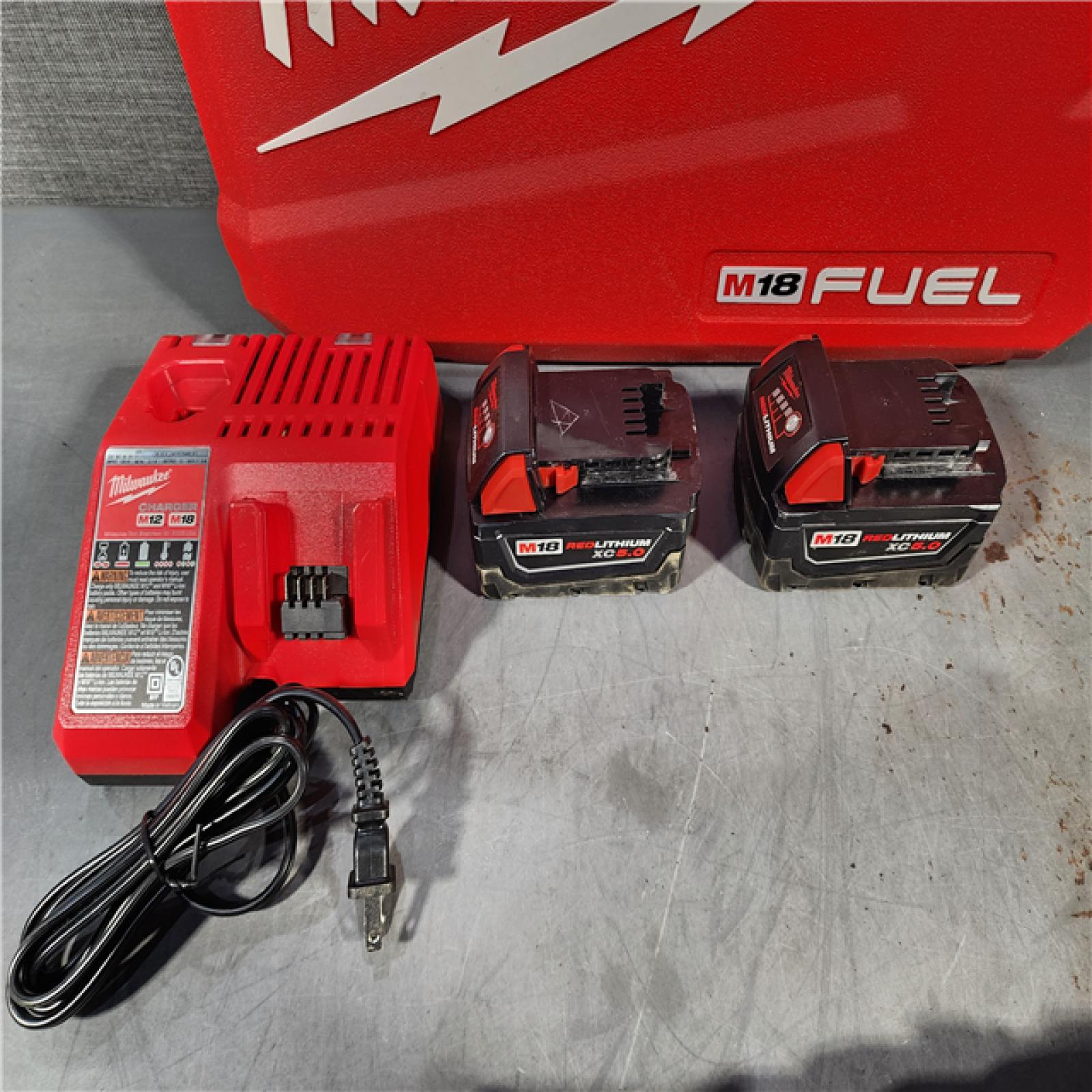 HOUSTON LOCATION - AS-IS Milwaukee M18 FUEL 18V Lithium-Ion Brushless Cordless Hammer Drill and Impact Driver Combo Kit (2-Tool) with 2 Batteries