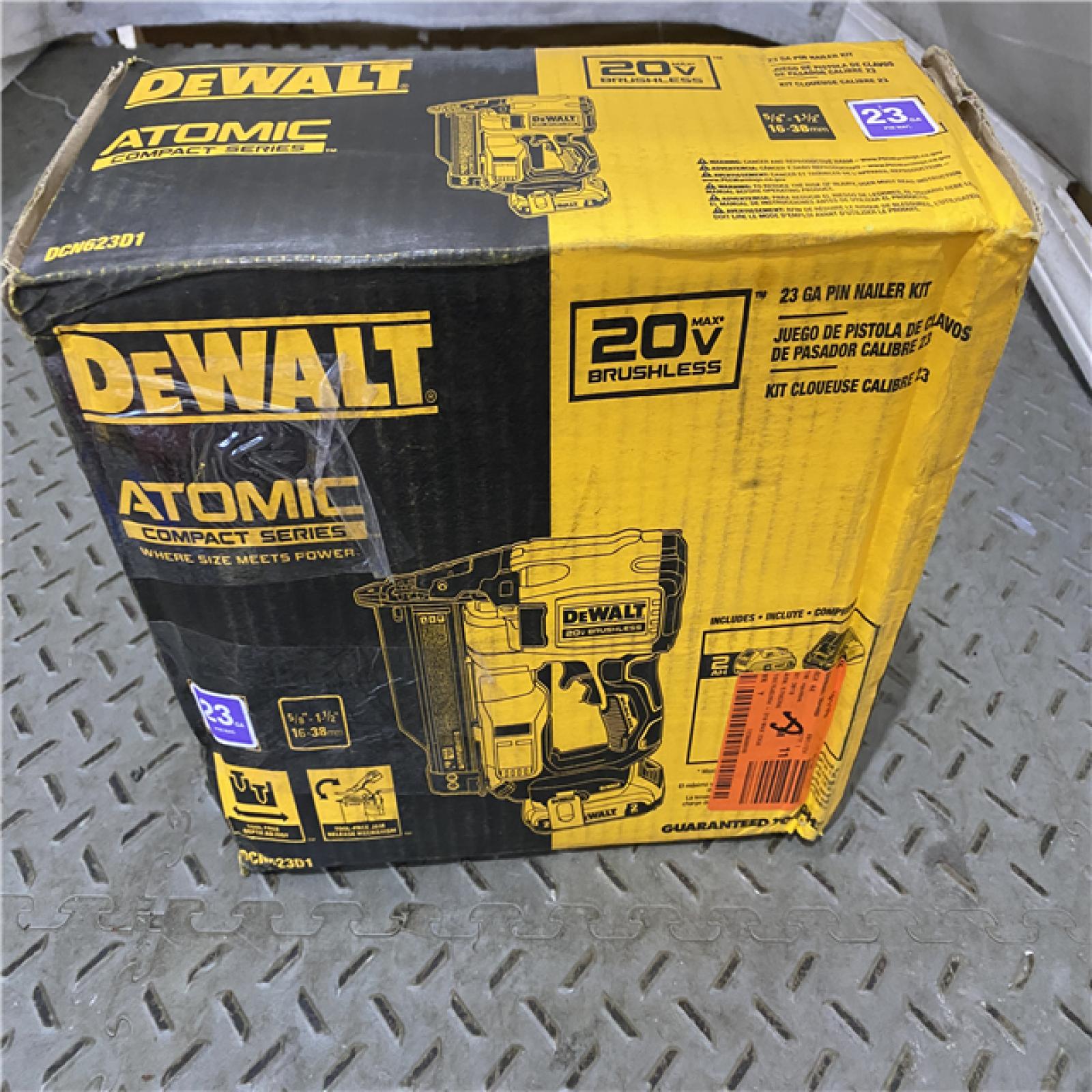 Houston location AS-IS DEWALT ATOMIC 20V MAX Lithium Ion Cordless 23 Gauge Pin Nailer Kit with 2.0Ah Battery and Charger