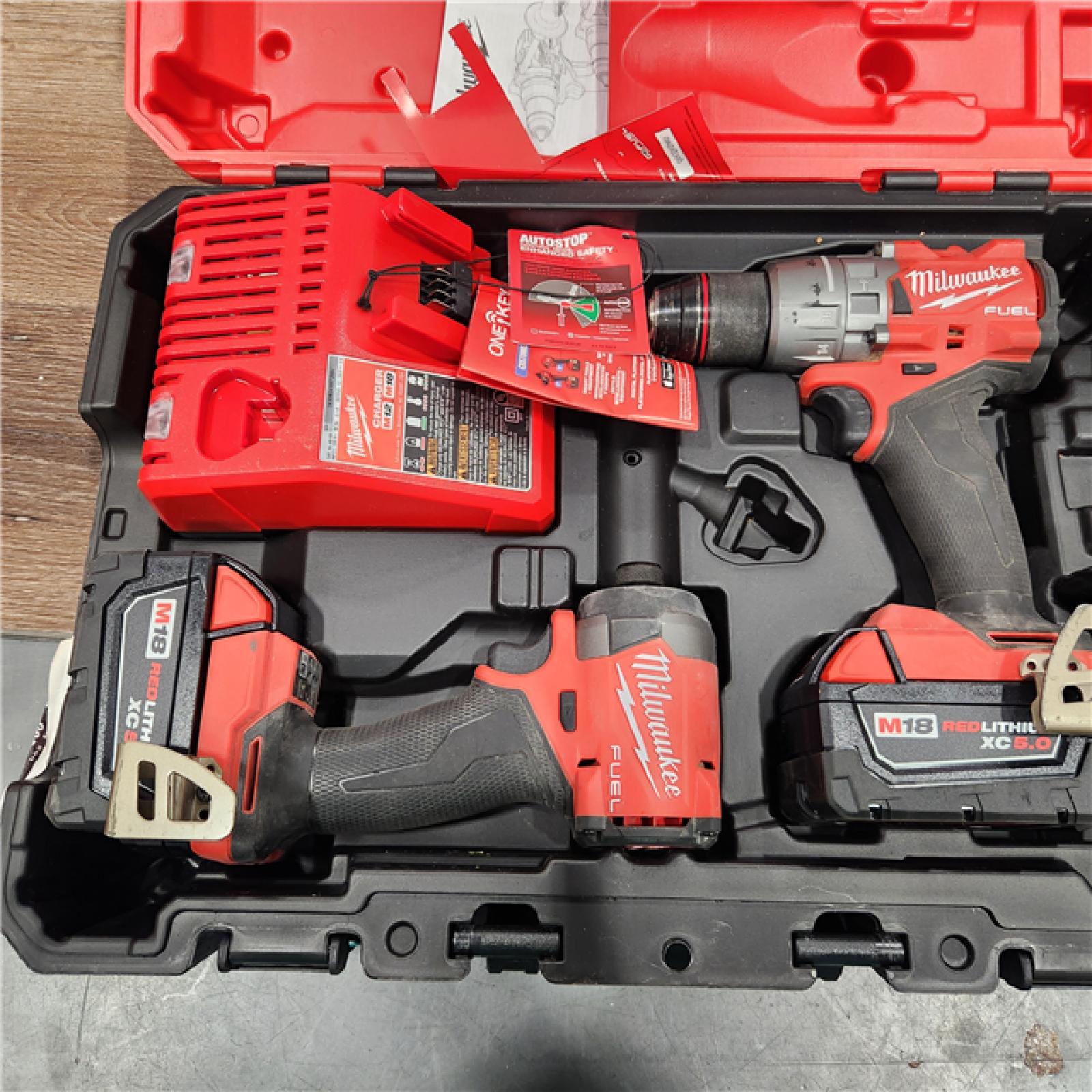 AS-IS Milwaukee M18 FUEL 18V Lithium-Ion Brushless Cordless Hammer Drill and Impact Driver Combo Kit (2-Tool) with 2 Batteries