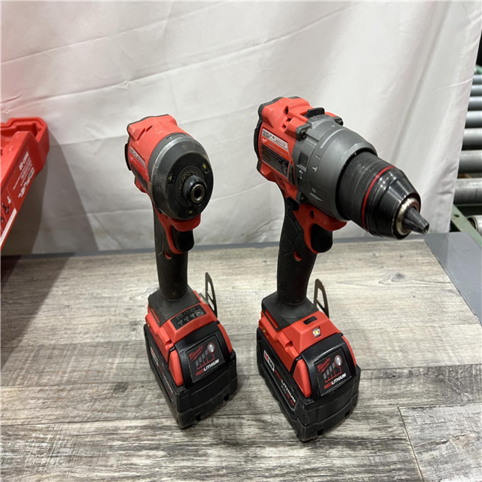 AS-IS Milwaukee M18 FUEL 18V Lithium-Ion Brushless Cordless Hammer Drill and Impact Driver Combo Kit (2-Tool) with 2 Batteries