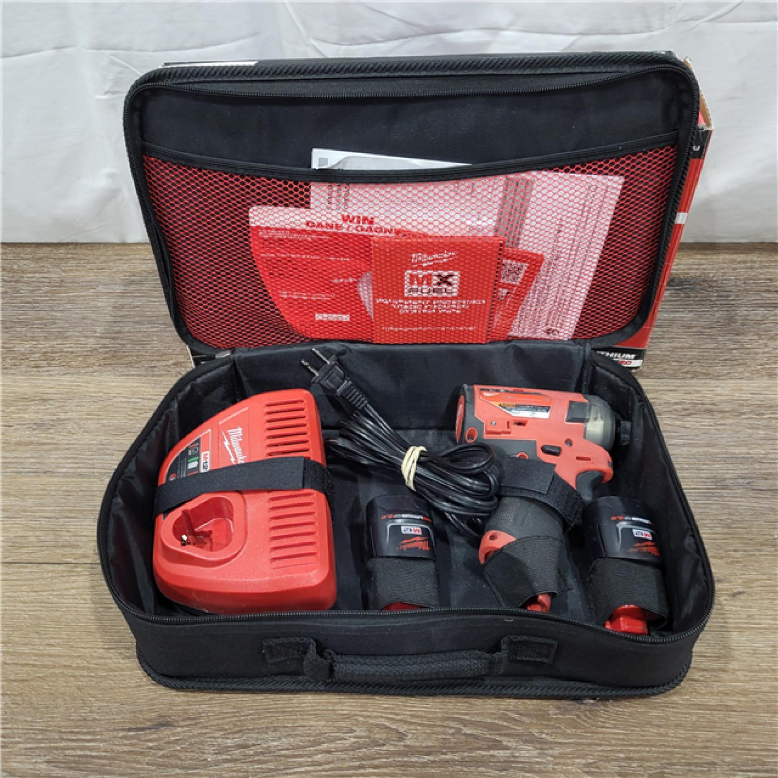 AS-IS M12 FUEL SURGE 12V Lithium-Ion Brushless Cordless 1/4 in. Hex Impact Driver Compact Kit W/Two 2.0Ah Batteries, Bag