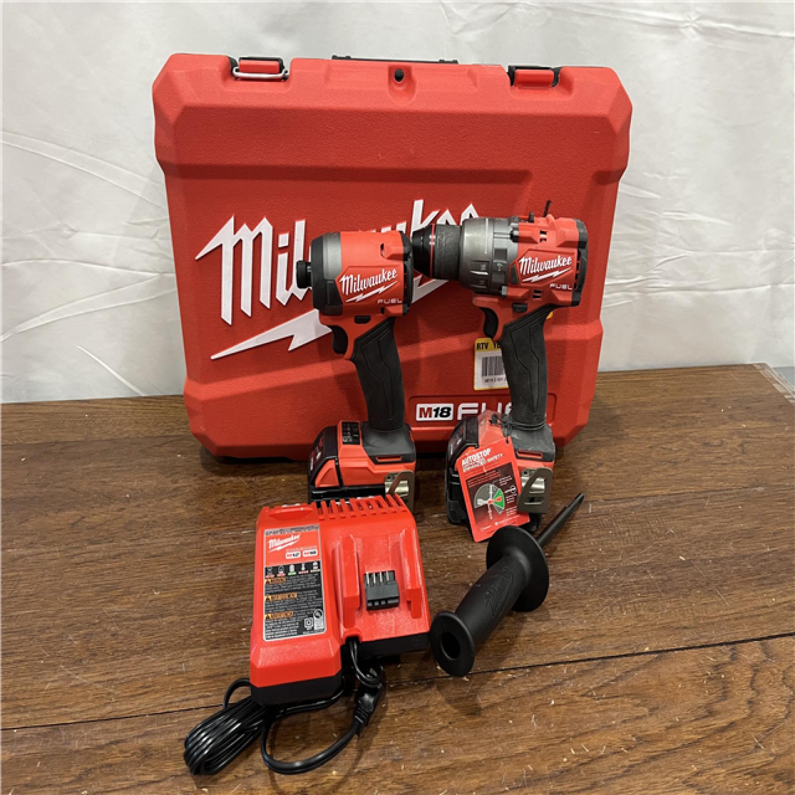 AS-ISMilwaukee M18 FUEL 18V Lithium-Ion Brushless Cordless Hammer Drill and Impact Driver Combo Kit (2-Tool) with 2 Batteries