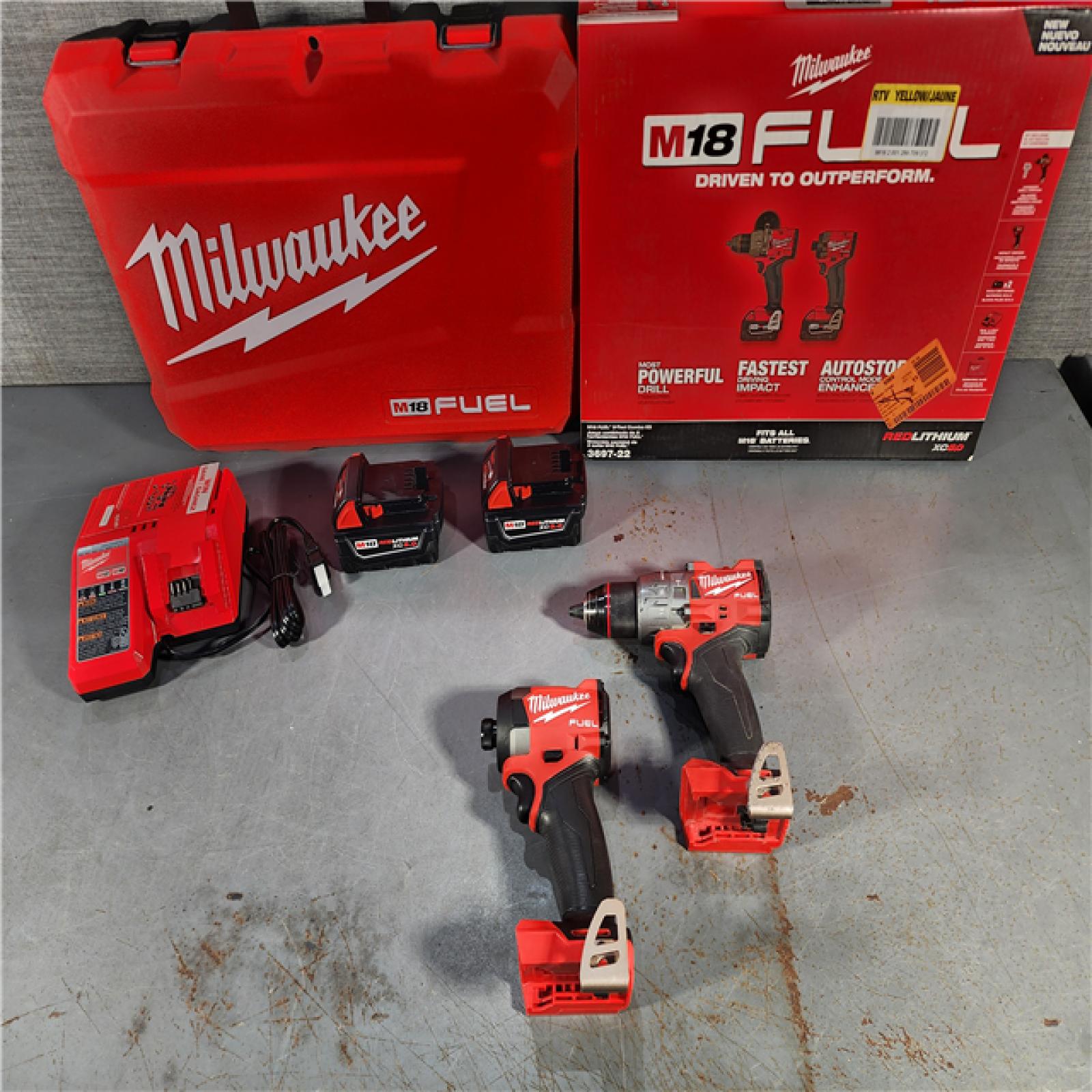 HOUSTON LOCATION - AS-IS Milwaukee M18 FUEL 18V Lithium-Ion Brushless Cordless Hammer Drill and Impact Driver Combo Kit (2-Tool) with 2 Batteries