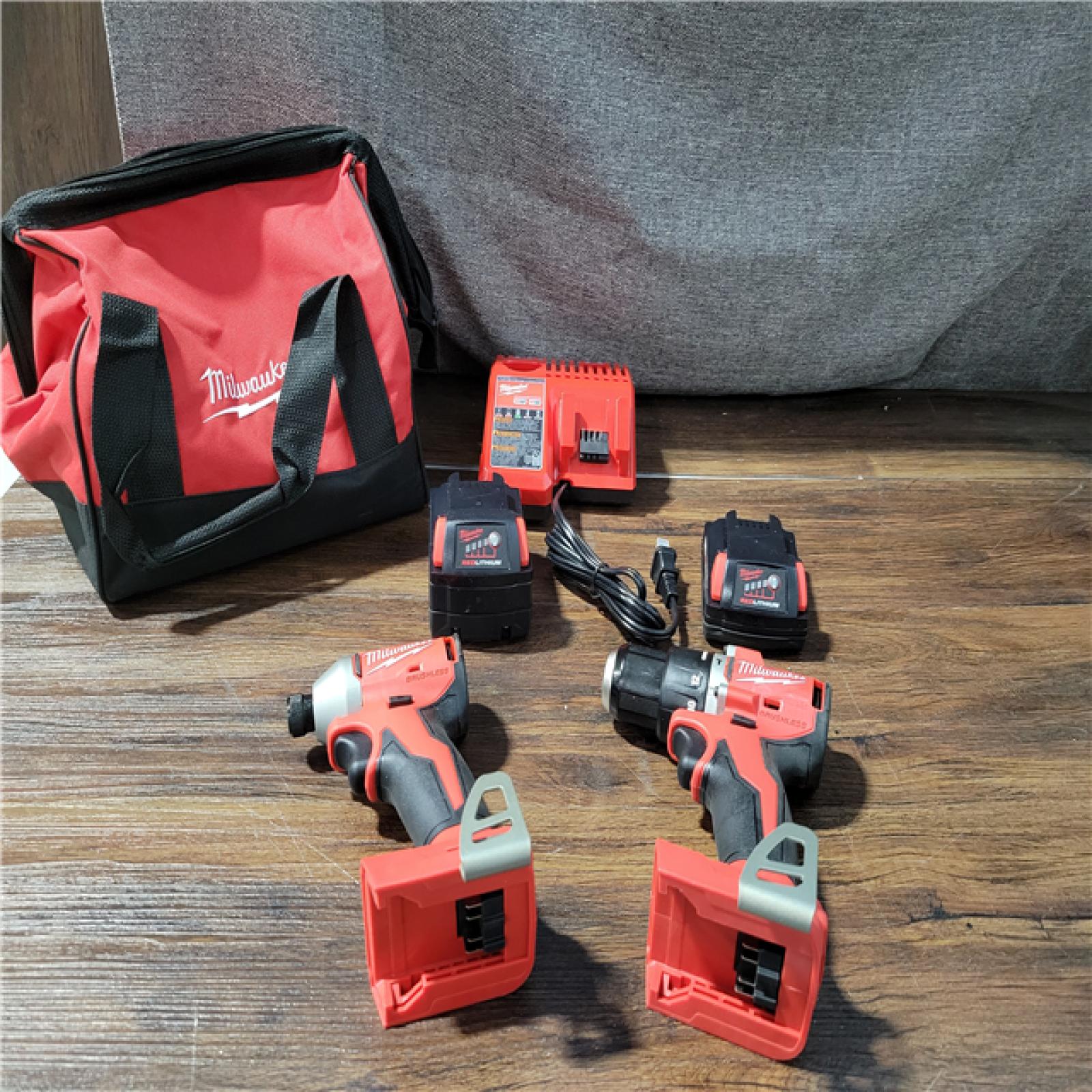 CALIFORNIA AS-IS MILWAUKEE M18 COMPACT BRUSHLESS 2-TOOL COMBO KIT(BATTERIES,CHARGER,AND BAG INCLUDED)