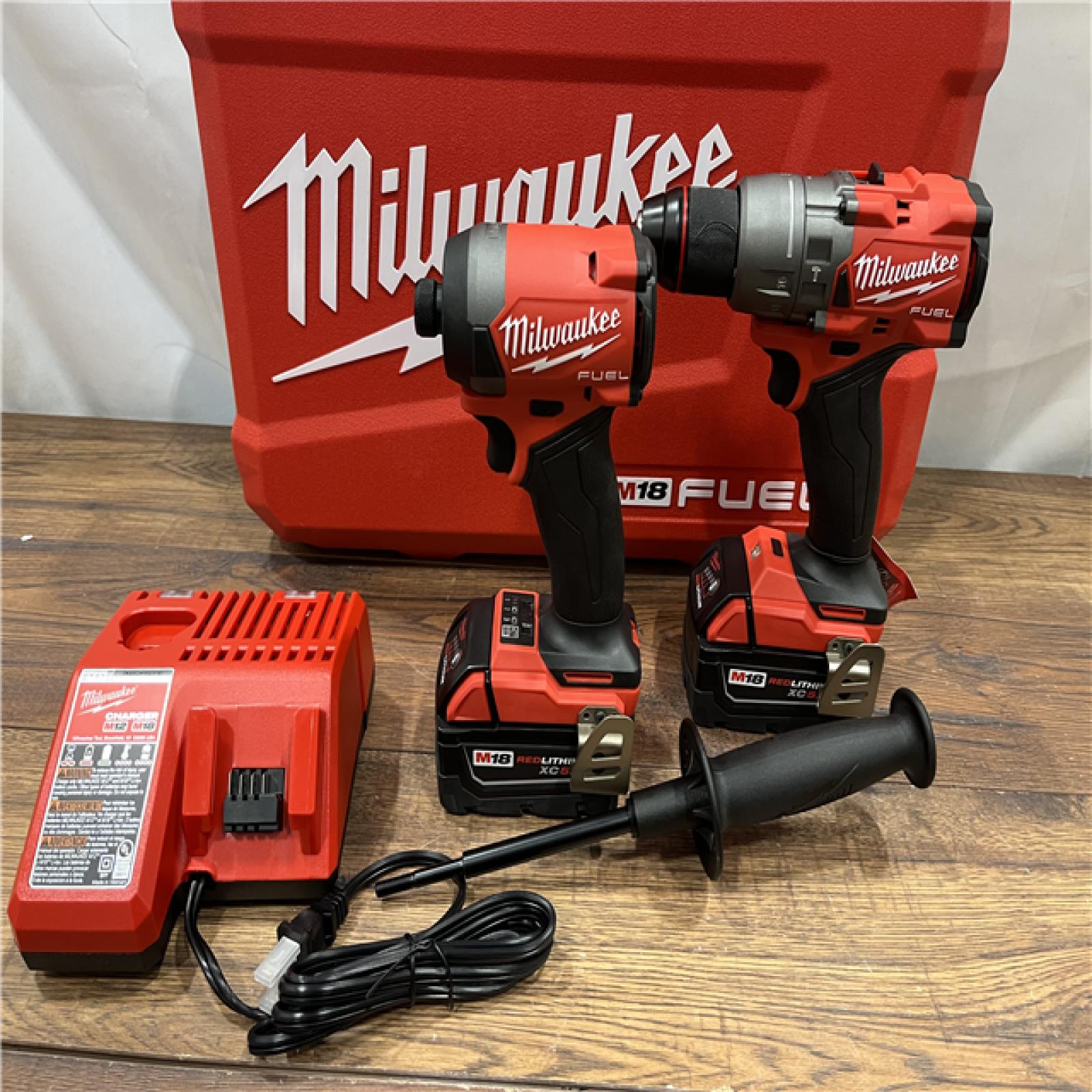 AS IS Milwaukee M18 FUEL 18V Lithium-Ion Brushless Cordless Hammer Drill and Impact Driver Combo Kit (2-Tool) with 2 Batteries