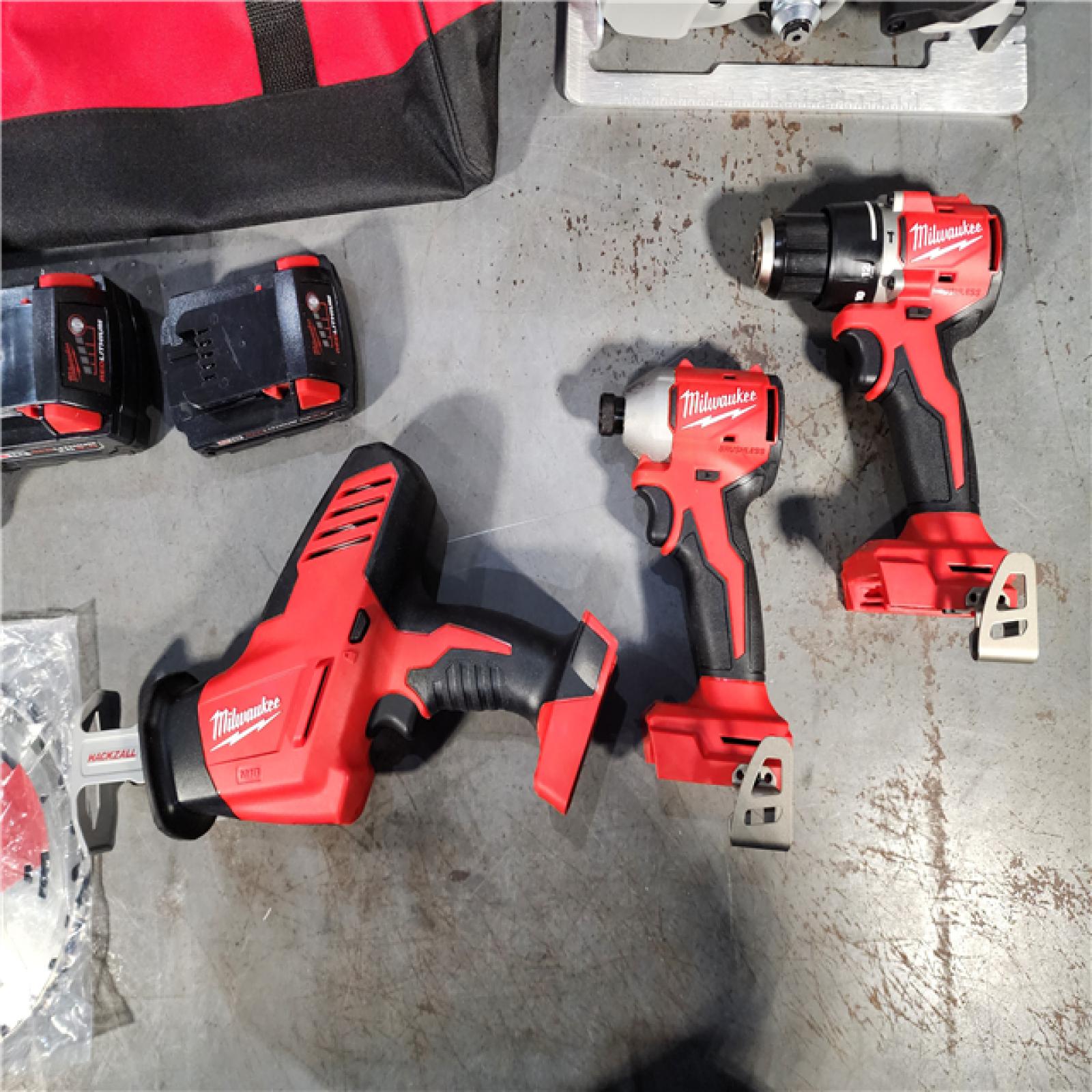 HOUSTON LOCATION - AS-IS Milwaukee M18 18-Volt Lithium-Ion Brushless Cordless Combo Kit (4-Tool) with 2-Batteries, 1-Charger and Tool Bag