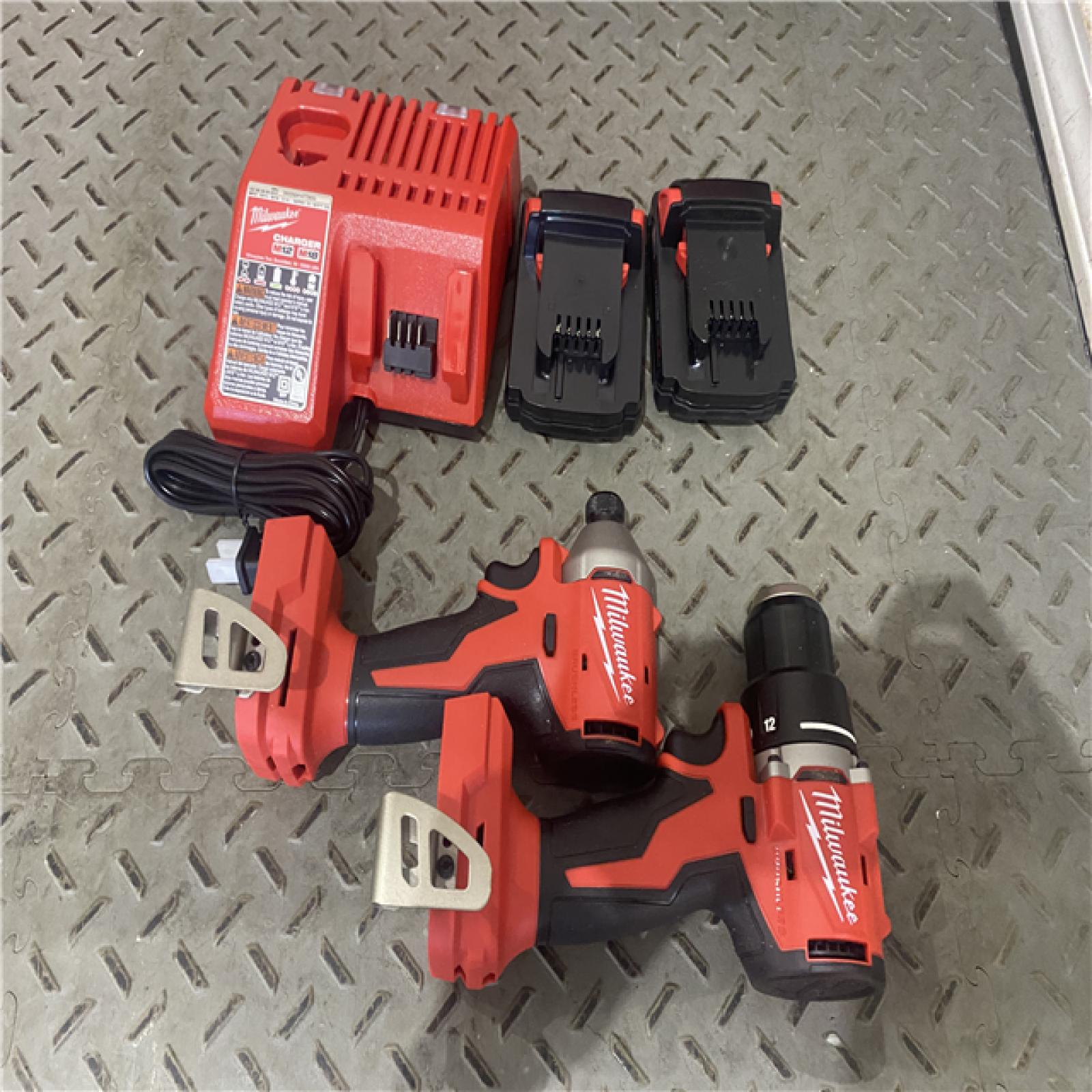 Houston location location AS-IS M18 18V Lithium-Ion Brushless Cordless Compact Drill/Impact Combo Kit (2-Tool) W/(2) 2.0 Ah Batteries, Charger & Bag