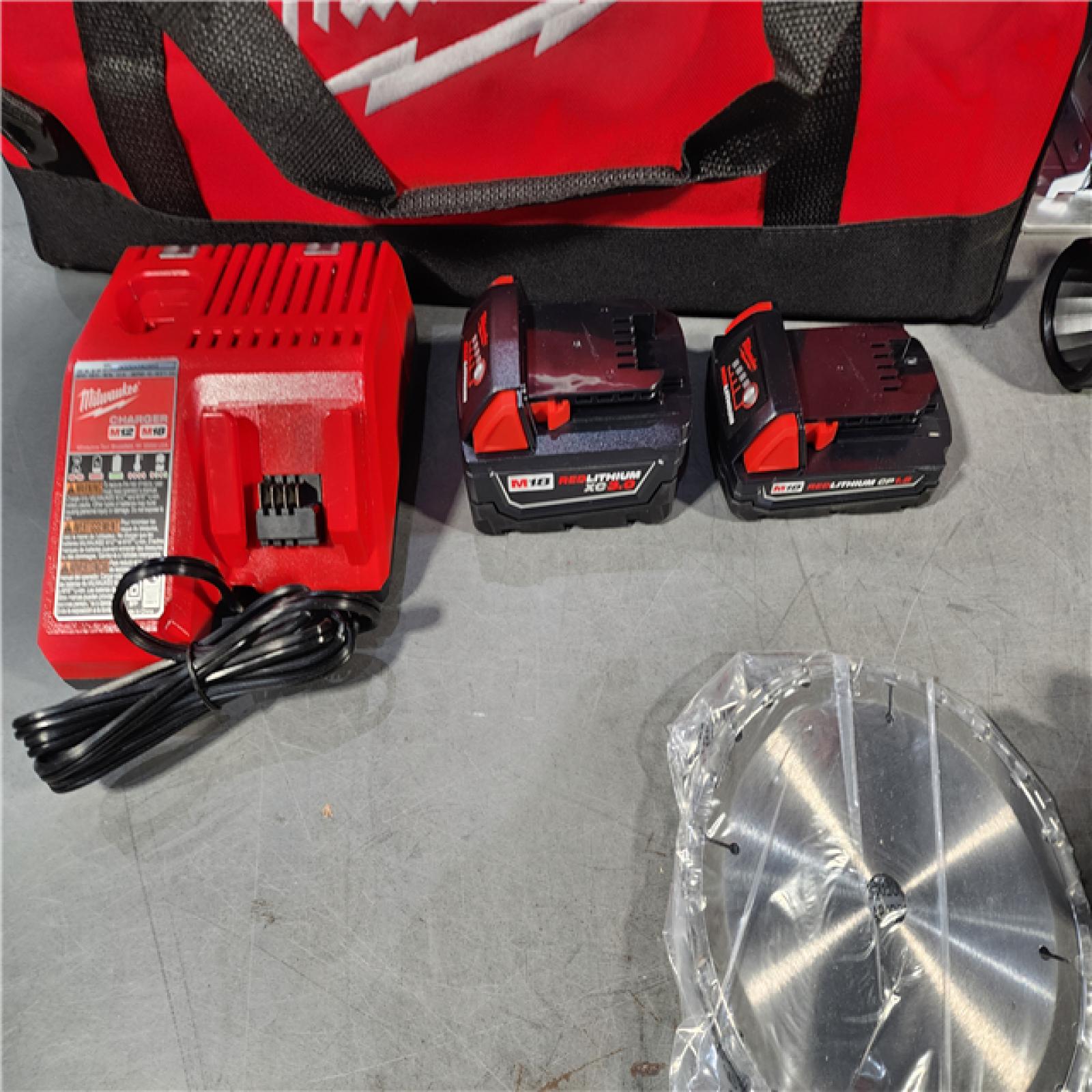 HOUSTON LOCATION - AS-IS (APPEARS LIKE NEW) Milwaukee M18 18-Volt Lithium-Ion Cordless Combo Tool Kit (5-Tool) with (1) 3.0Ah and (1) 1.5Ah Battery, (1) Charger, (1) Tool Bag