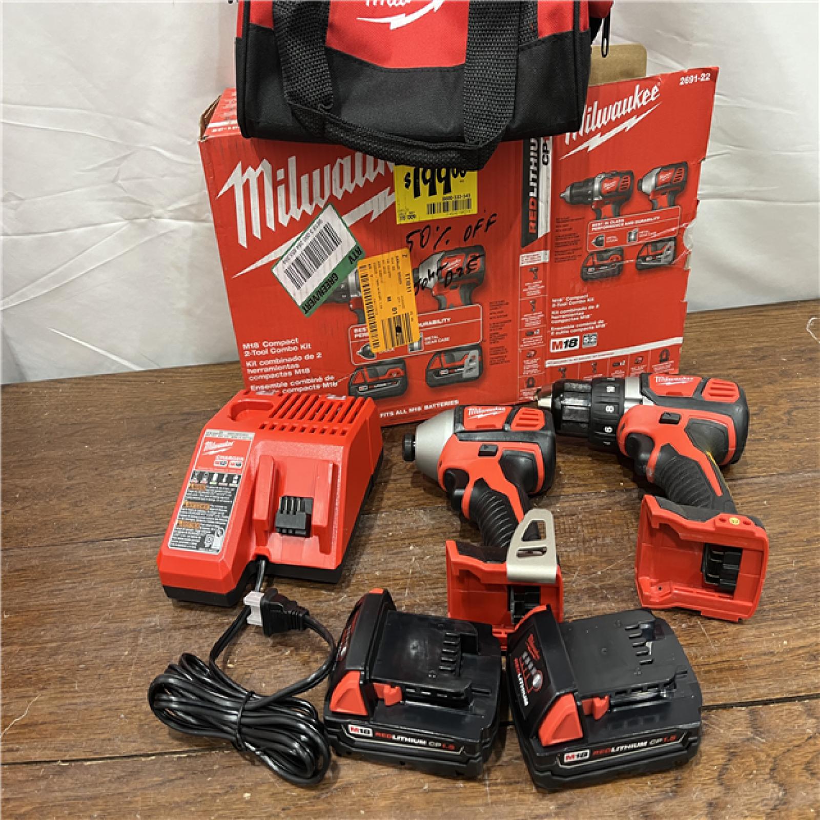 AS-ISMilwaukee M18 18V Cordless Brushed 2 Tool Drill/Driver and Impact Driver Kit