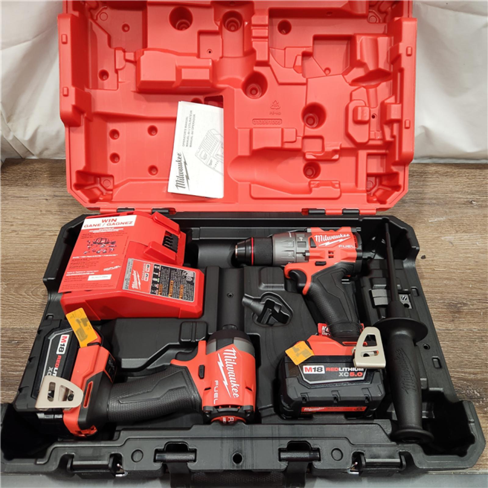 AS-IS Milwaukee 2697-22 M18 18-Volt 1/2-Inch 2-Tool Combo Kit Includes Charger, Battery (2) and Bag