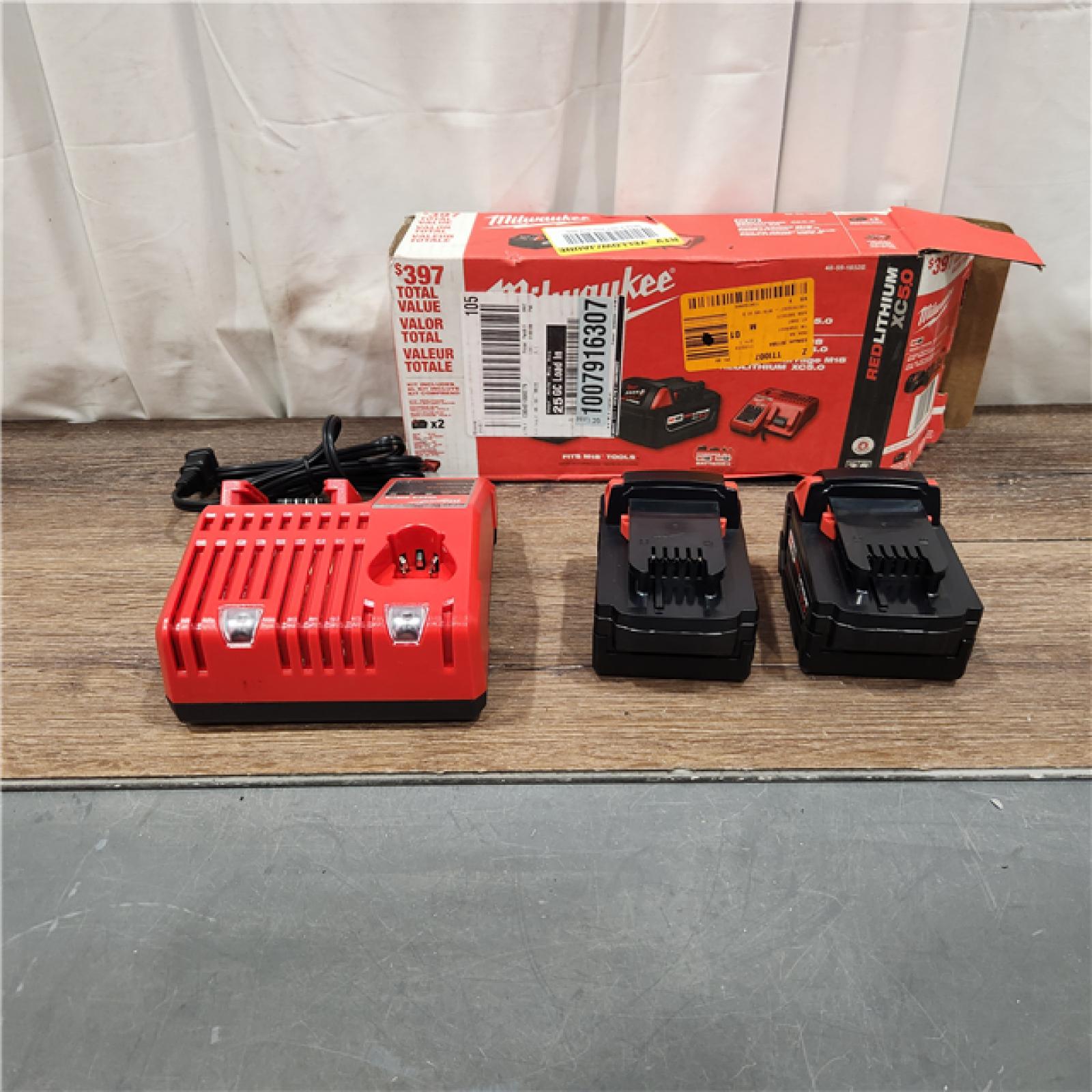 AS IS M18 18-Volt Lithium-Ion XC Starter Kit with Two 5.0Ah Batteries and Charger