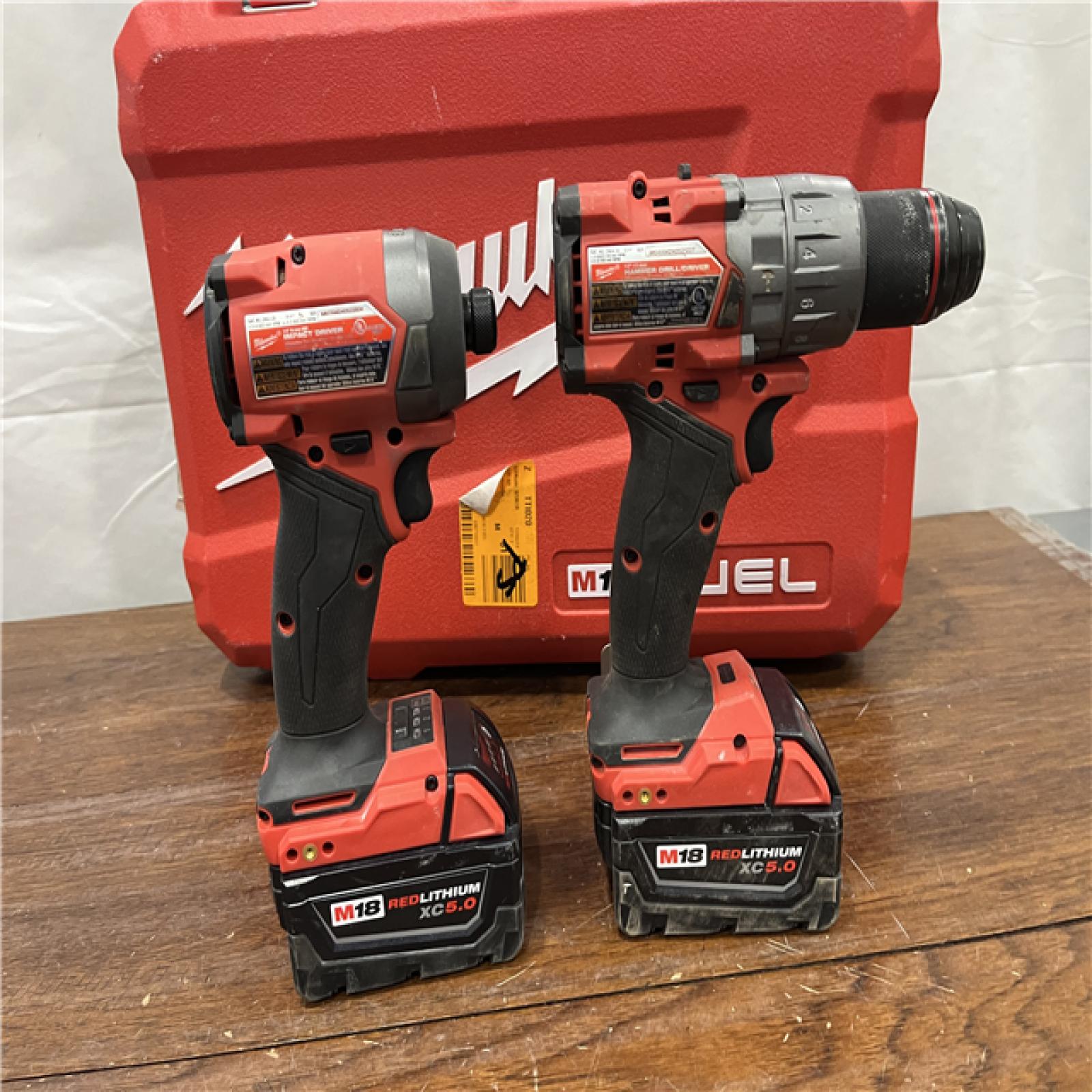 AS-IS Milwaukee M18 FUEL 18V Lithium-Ion Brushless Cordless Hammer Drill and Impact Driver Combo Kit (2-Tool) with 2 Batteries