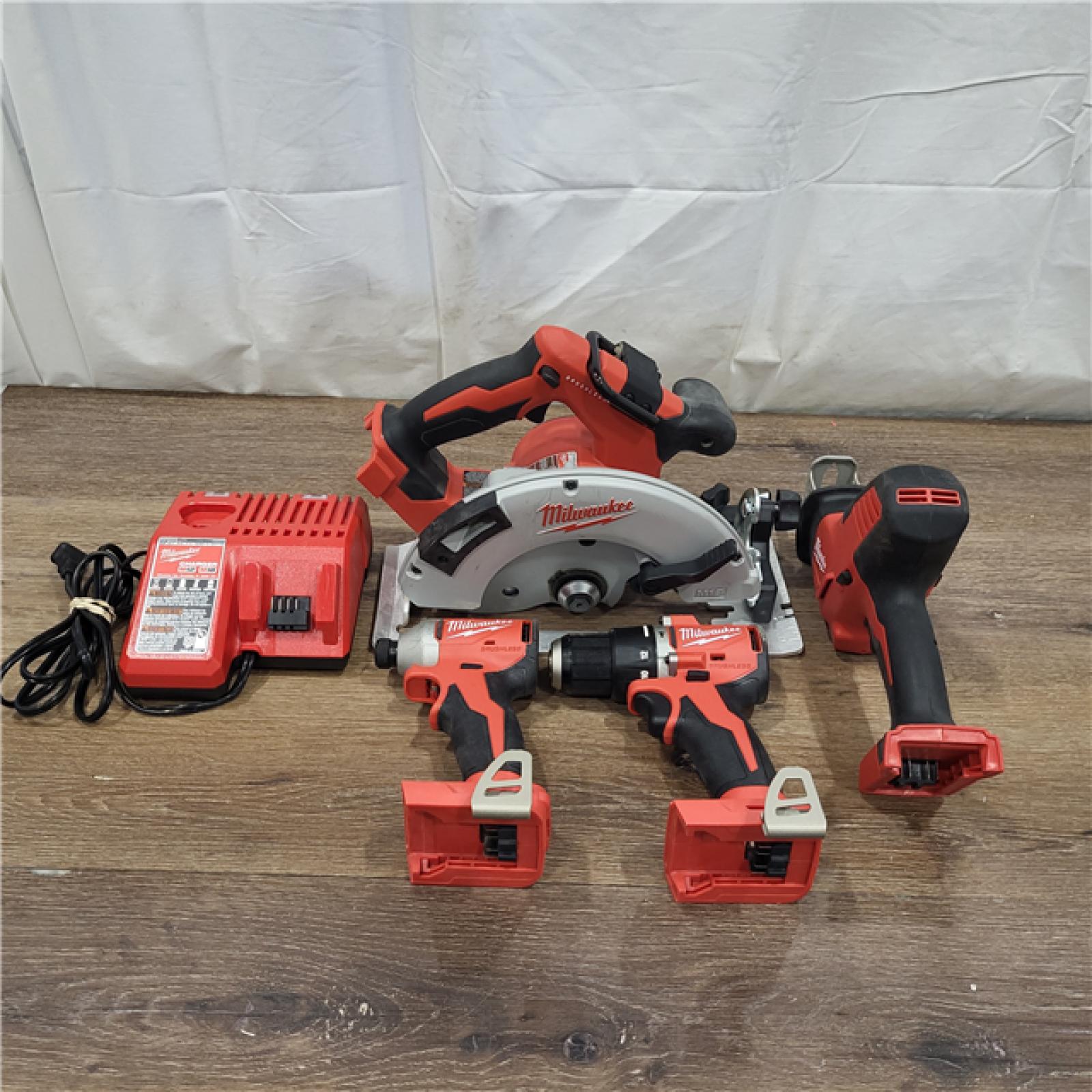 AS-IS M18 18-Volt Lithium-Ion Brushless Cordless Combo Kit (4-Tool) with 2-Batteries, 1-Charger and Tool Bag