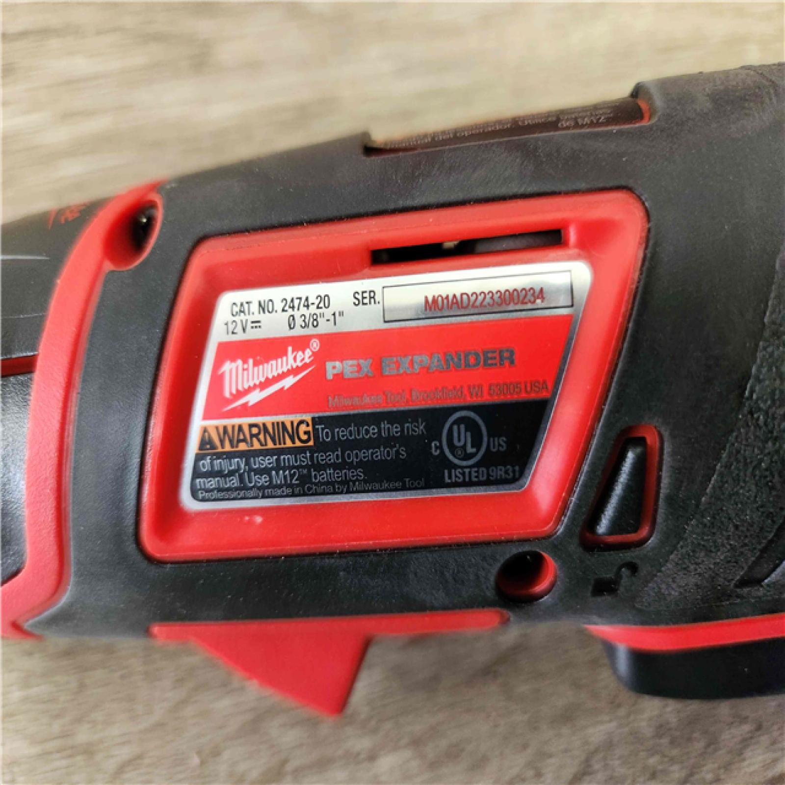 Phoenix Location Appears NEW Milwaukee M12 Cordless PEX Expansion Tool Kit with 1 in. Plastic Tubing Cutter 2474-232