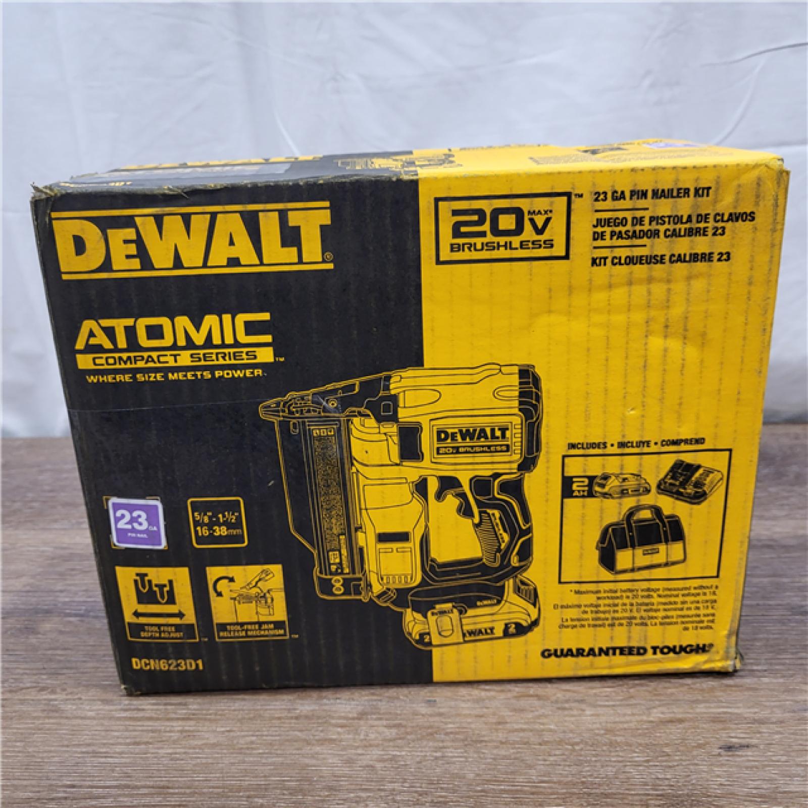 AS-IS DEWALT ATOMIC 20V MAX Lithium Ion Cordless 23 Gauge Pin Nailer Kit with 2.0Ah Battery and Charger