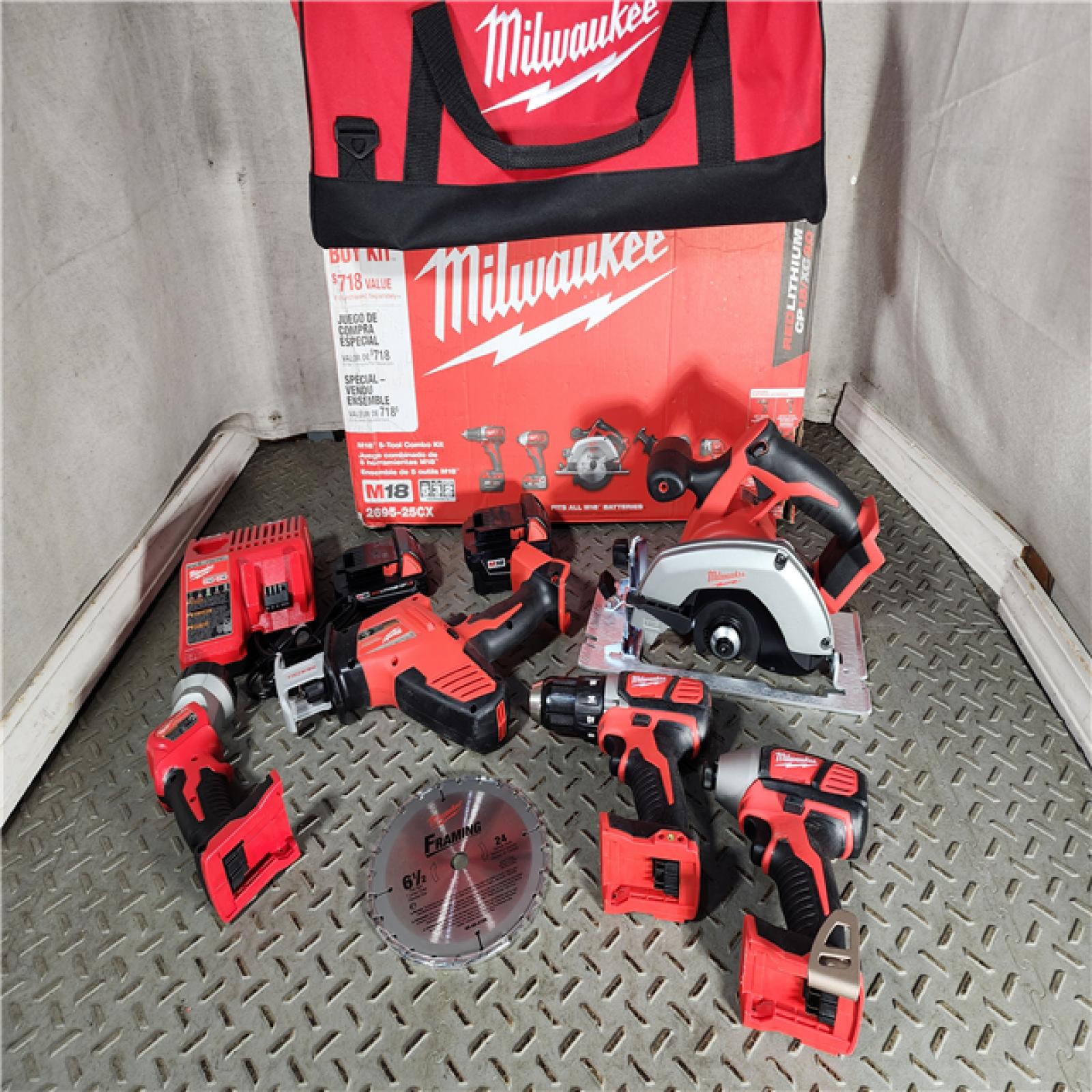 HOUSTON LOCATION - AS-IS (APPEARS LIKE NEW) Milwaukee M18 18-Volt Lithium-Ion Cordless Combo Tool Kit (5-Tool) with (1) 3.0Ah and (1) 1.5Ah Battery, (1) Charger, (1) Tool Bag