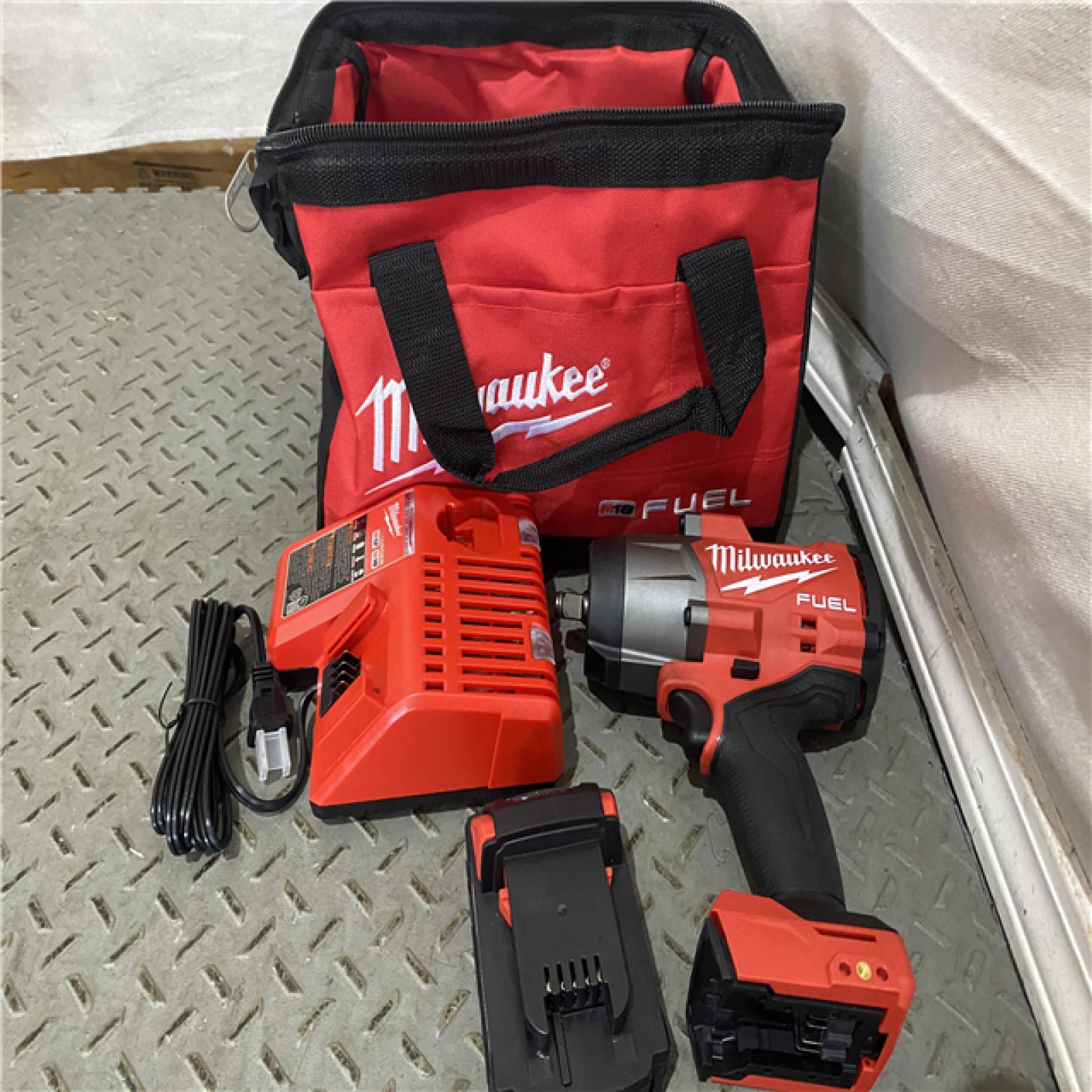 Houston location AS-IS Milwaukee 2967-21B M18 FUEL 1/2 High Torque Impact Wrench W/ Friction Ring 5.0Ah Kit