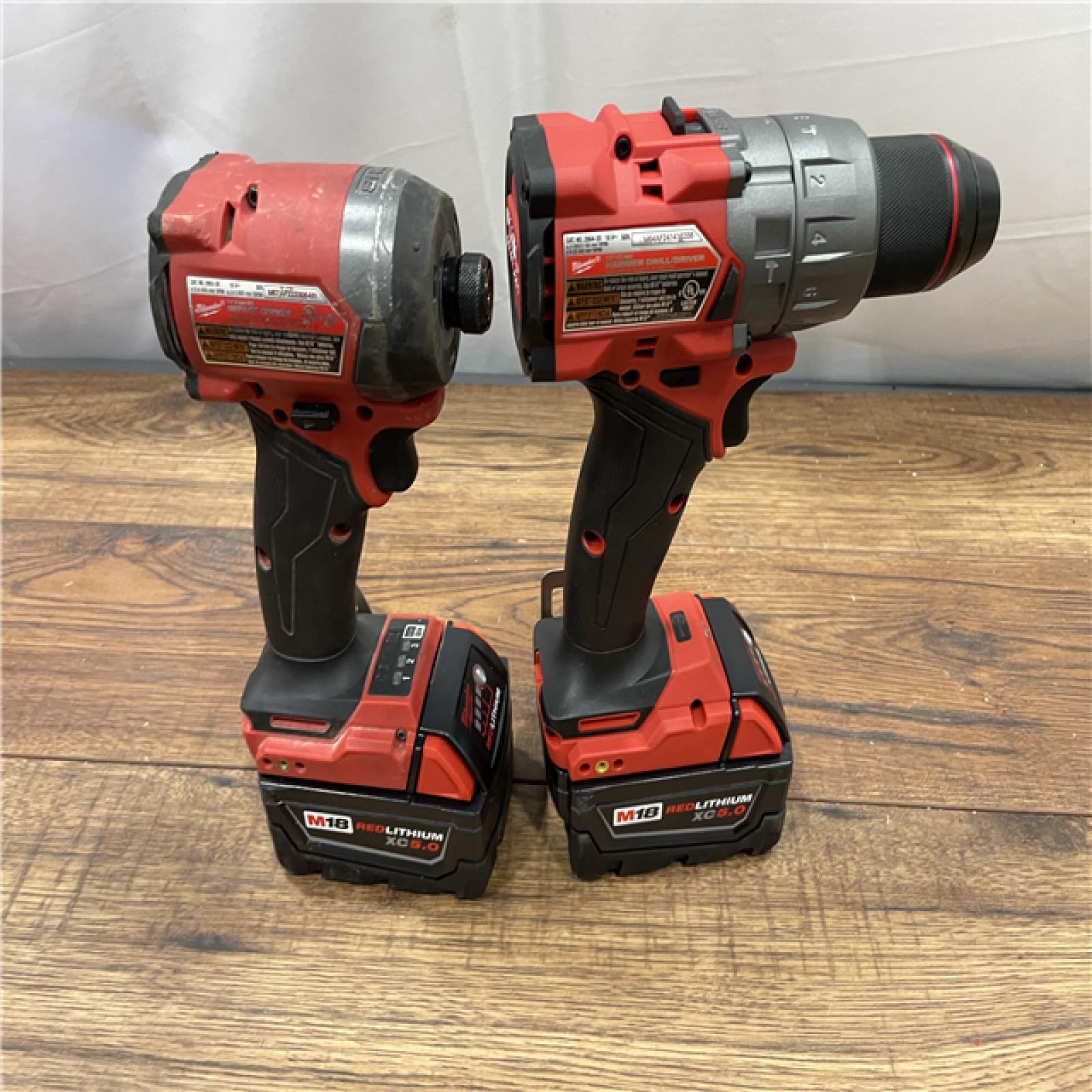 AS-IS MILWAUKEE M18 FUEL 18V Lithium-Ion Brushless Cordless Hammer Drill and Impact Driver Combo Kit (2-Tool)