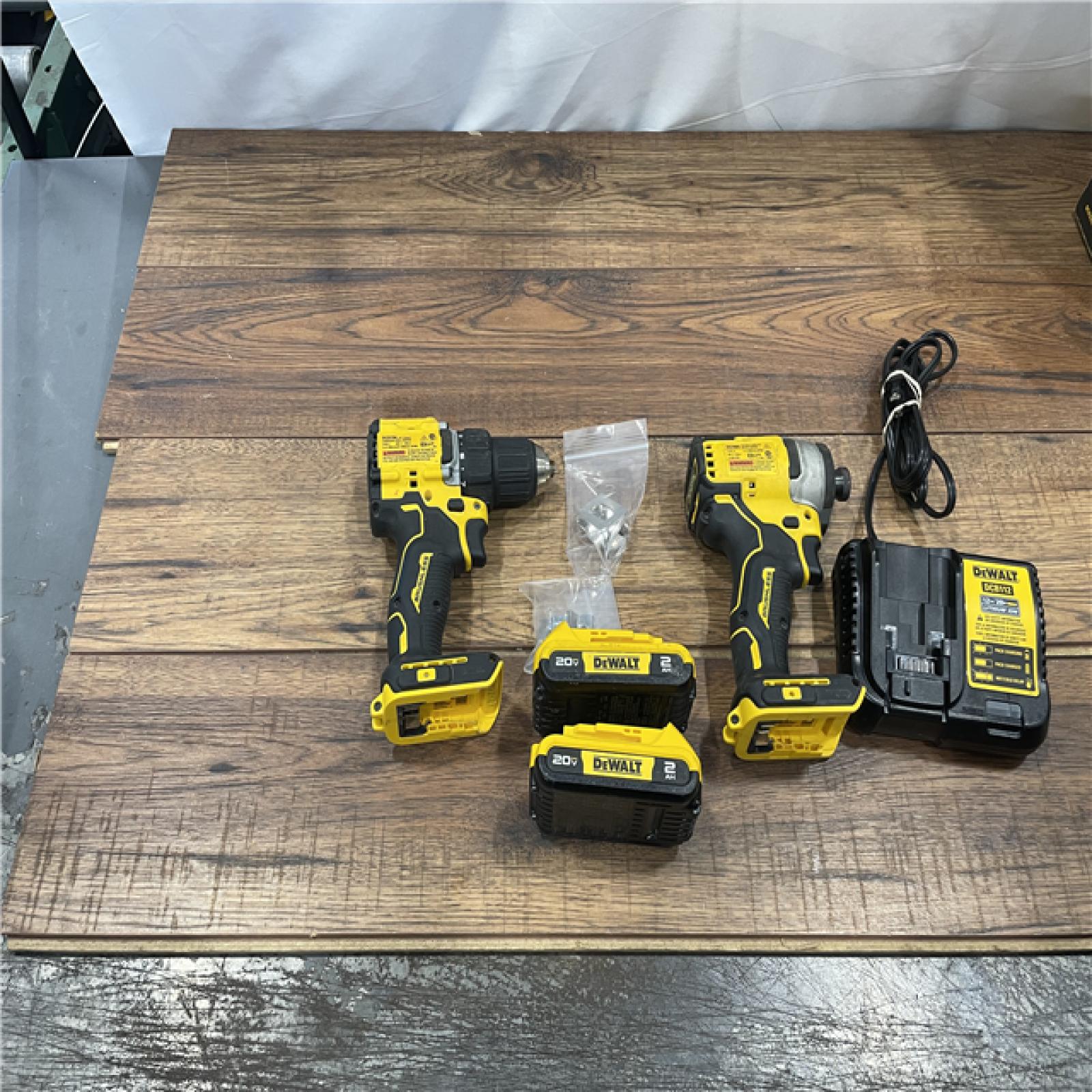 AS-IS DEWALT ATOMIC 20-Volt MAX Lithium-Ion Cordless Combo Kit (2-Tool) with (2) 2.0Ah Batteries, Charger and Bag