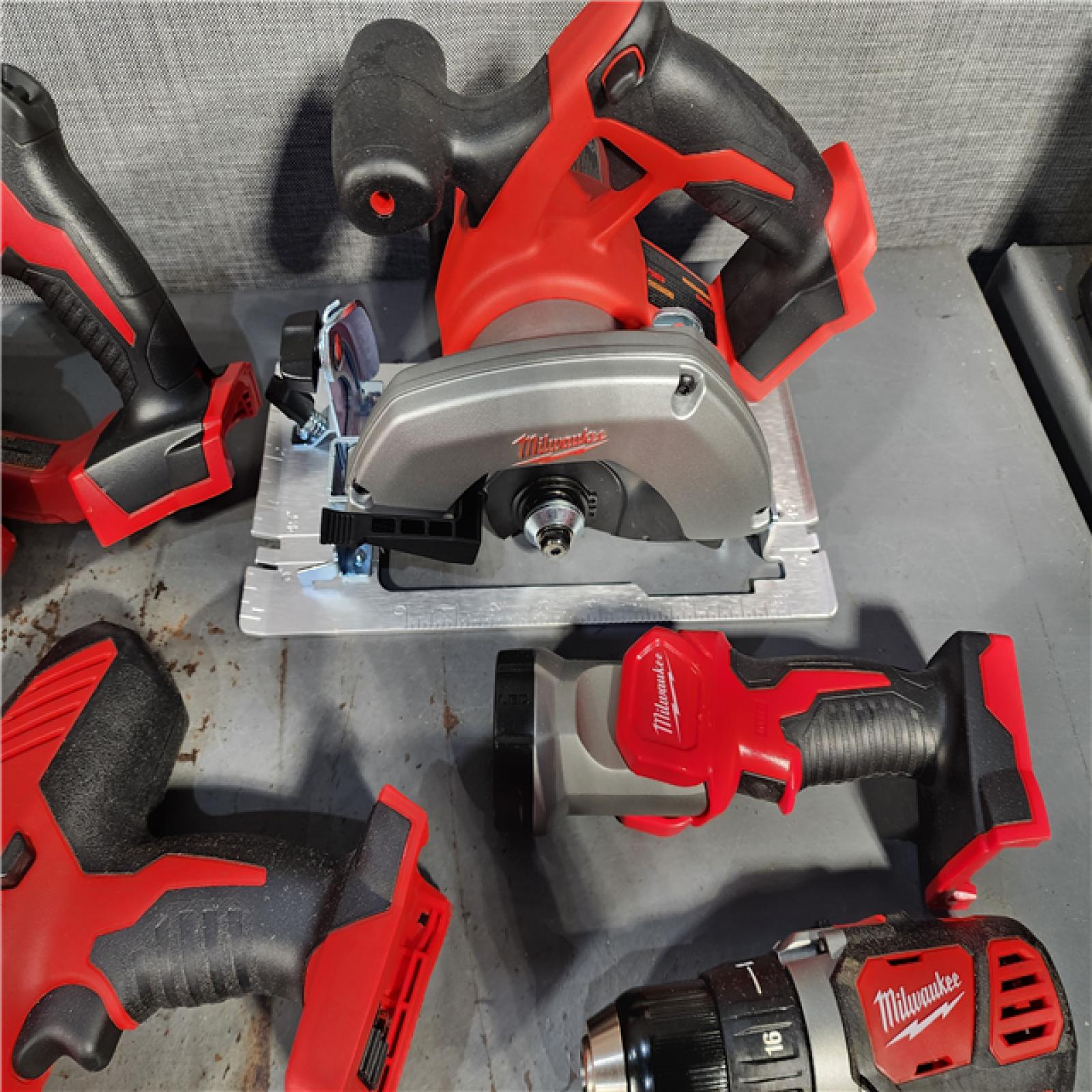 HOUSTON LOCATION - AS-IS M18 18-Volt Lithium-Ion Cordless Combo Kit (9-Tool) with (2) Batteries, Charger, and Tool Bag