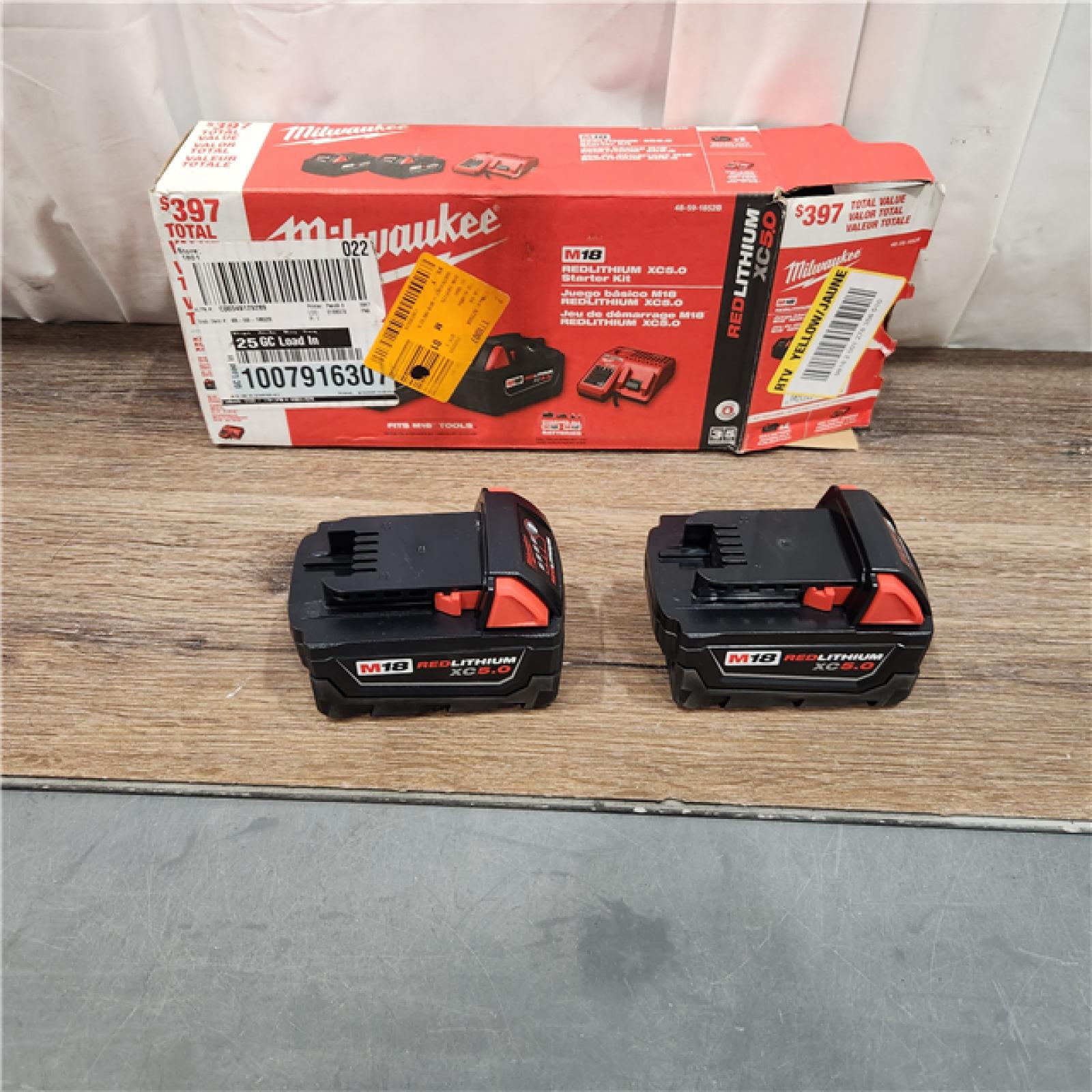 AS IS M18 18-Volt Lithium-Ion XC Starter Kit with Two 5.0Ah Batteries and Charger