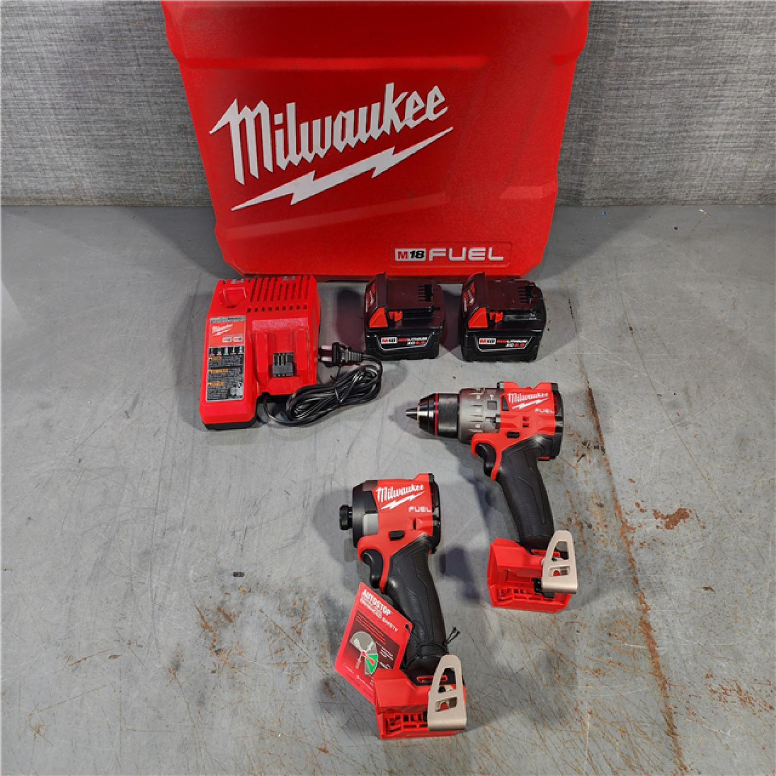 HOUSTON LOCATION - AS-IS (APPEARS LIKE NEW) Milwaukee M18 FUEL 18V Lithium-Ion Brushless Cordless Hammer Drill and Impact Driver Combo Kit (2-Tool) with 2 Batteries