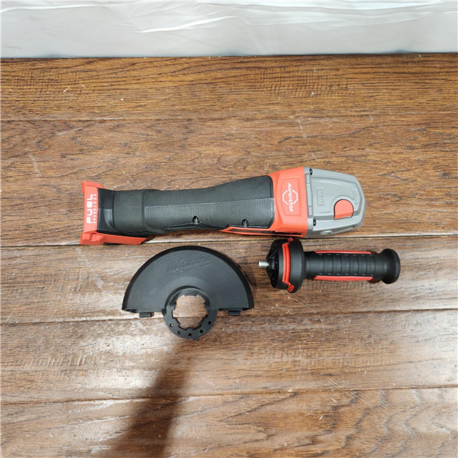 AS-IS Milwaukee 2880-20 M18 FUEL 18-Volt Lithium-Ion Brushless Cordless 4-1/2 in./5 in. Grinder W/Paddle Switch (Tool-Only)