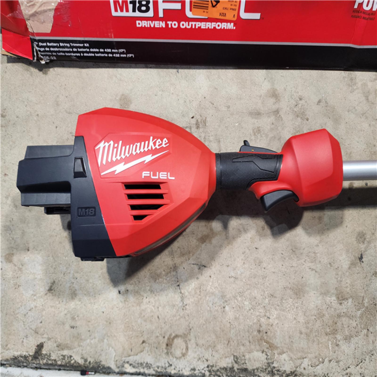 HOUSTON LOCATION - AS-IS (APPEARS LIKE NEW) Milwaukee M18 FUEL 18V Brushless Cordless 17 in. Dual Battery Straight Shaft String Trimmer Kit