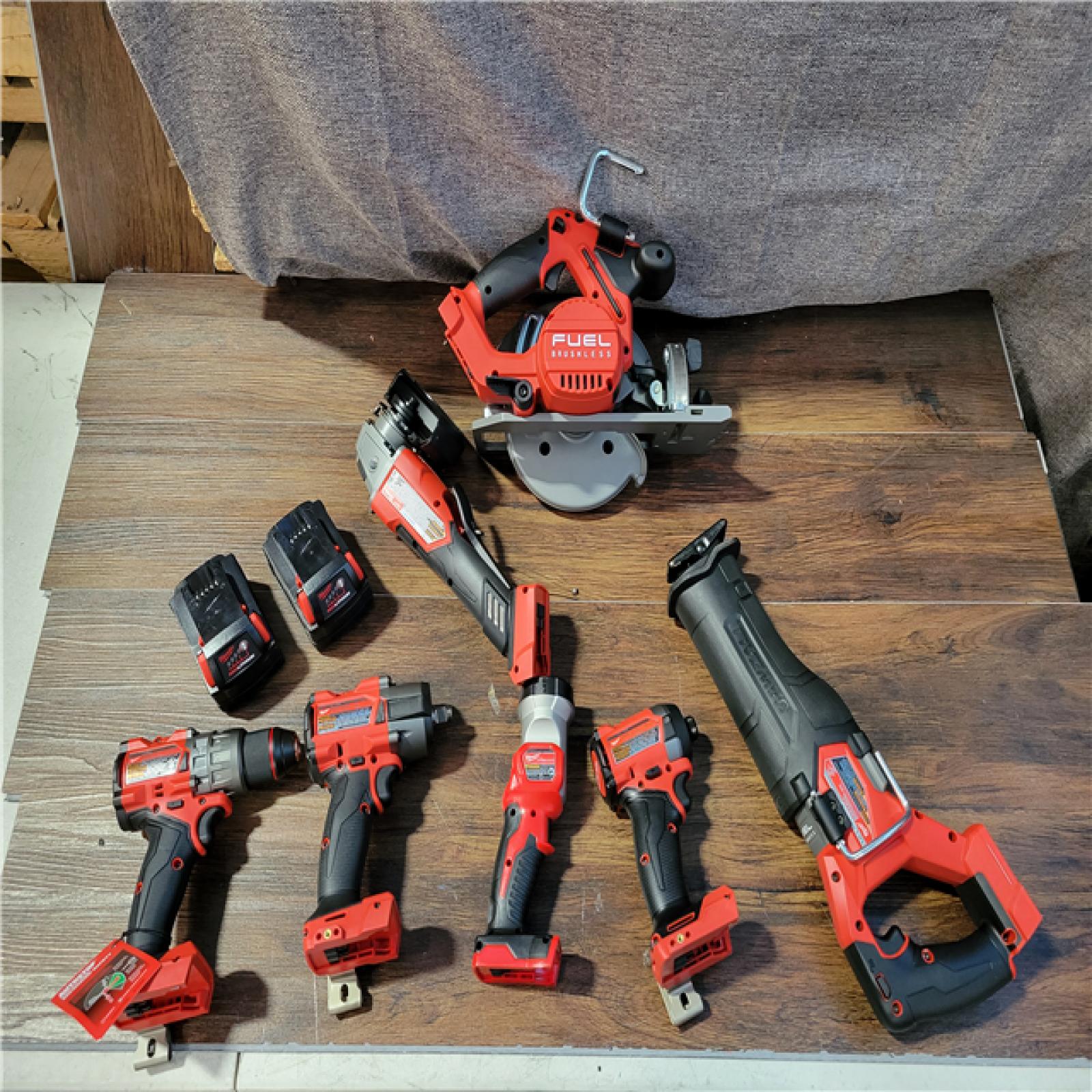 CALIFORNIA NEW MILWAUKEE M18 7-TOOL COMBO KIT (2 BATTERIES, 1 CHARGER, AND 2BAGS INCLUDED)