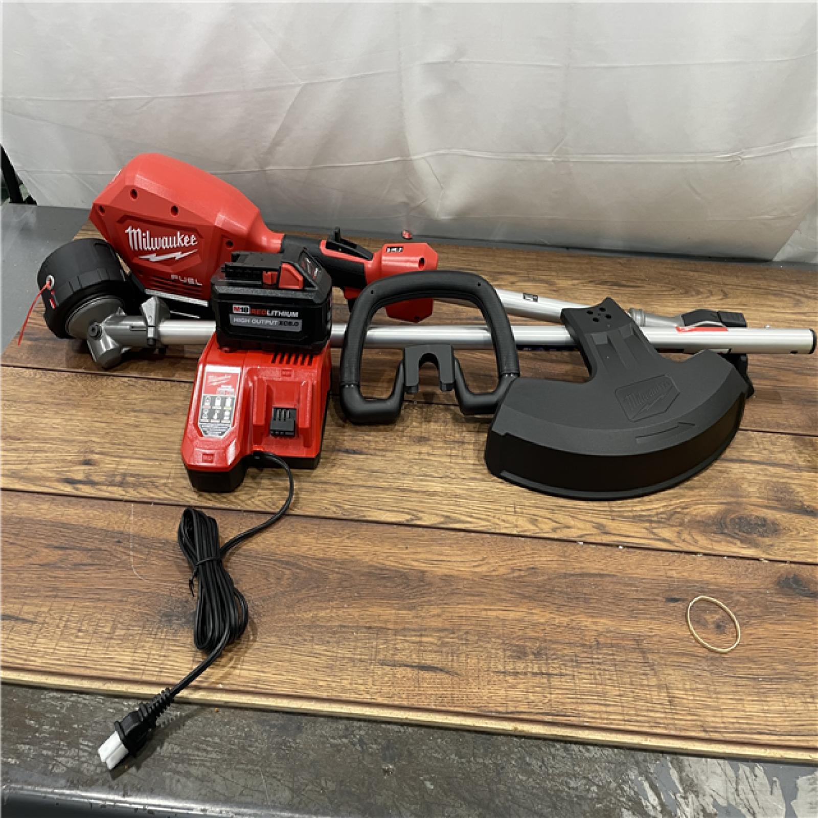 AS-IS Milwaukee M18 FUEL 18V Lithium-Ion Brushless Cordless String Trimmer with QUIK-LOK Attachment Capability and 8.0 Ah Battery