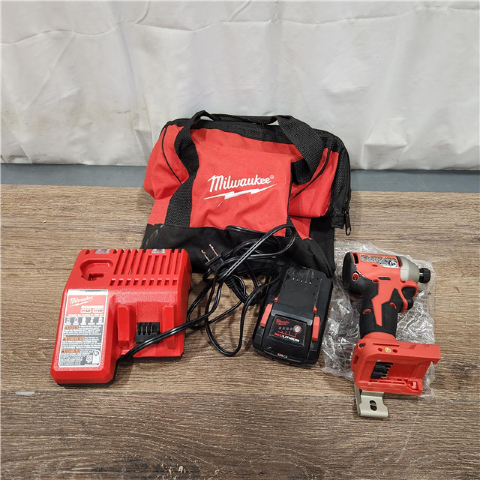 AS-IS Milwaukee M18 Compact Brushless 1/4  Hex Impact Driver Kit