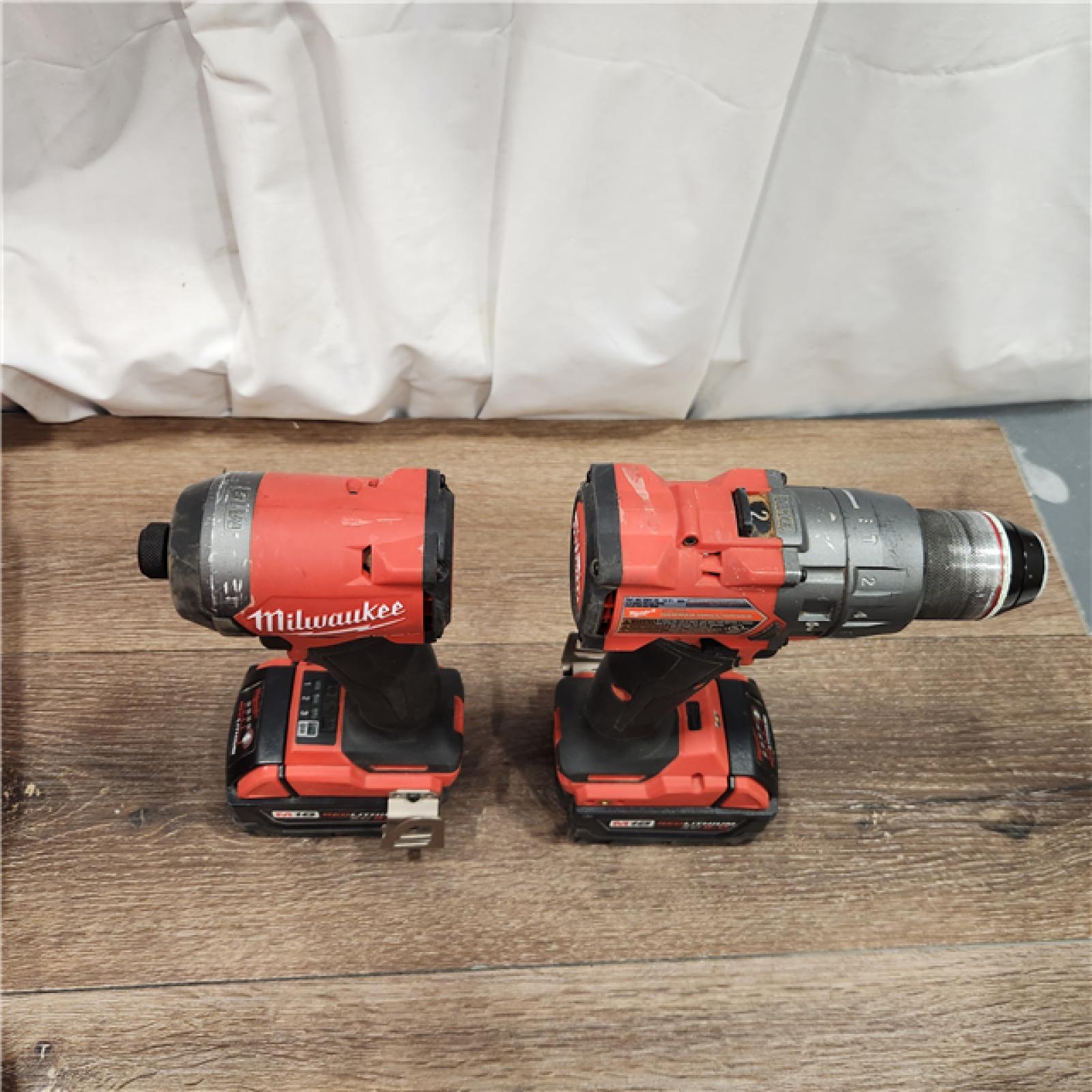 AS-IS Milwaukee M18 FUEL 18V Lithium-Ion Brushless Cordless Hammer Drill and Impact Driver Combo Kit (2-Tool) with 2 Batteries