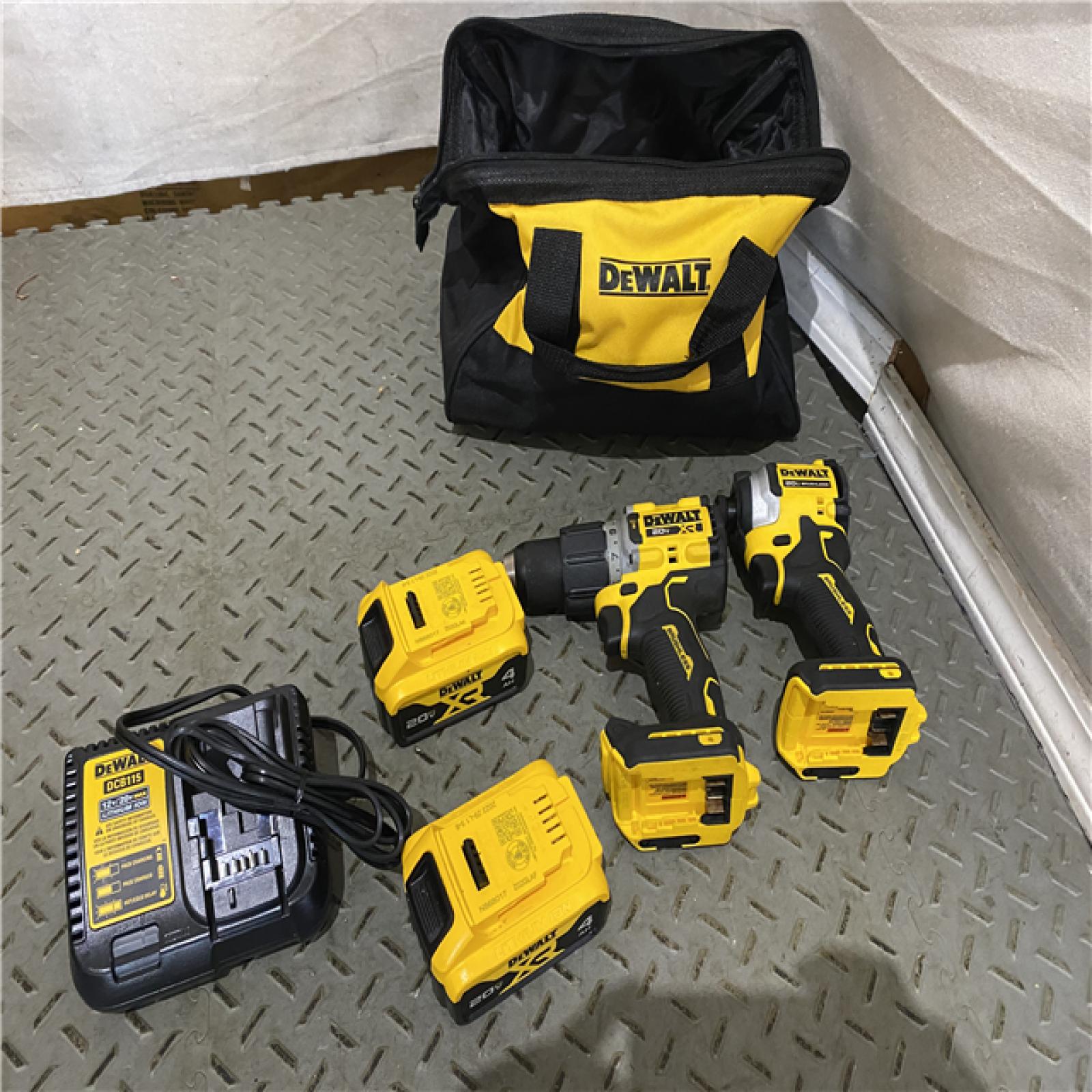 Houston location AS-IS DEWALT 20V MAX XR Hammer Drill and ATOMIC Impact Driver 2 Tool Cordless Combo Kit with (2) 4.0Ah Batteries, Charger, and Bag