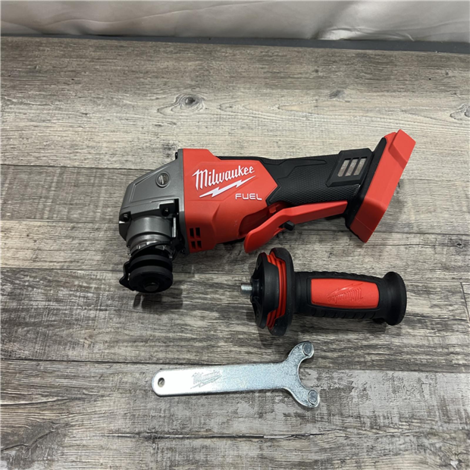 AS-IS Milwaukee 2880-20 M18 FUEL 18-Volt Lithium-Ion Brushless Cordless 4-1/2 in./5 in. Grinder W/Paddle Switch (Tool-Only)