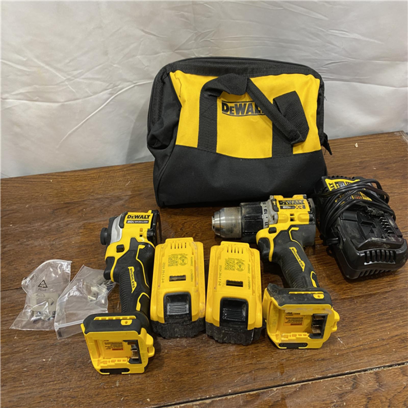 AS-ISDEWALT 20V MAX XR Hammer Drill and ATOMIC Impact Driver 2 Tool Cordless Combo Kit with (2) 4.0Ah Batteries, Charger, and Bag