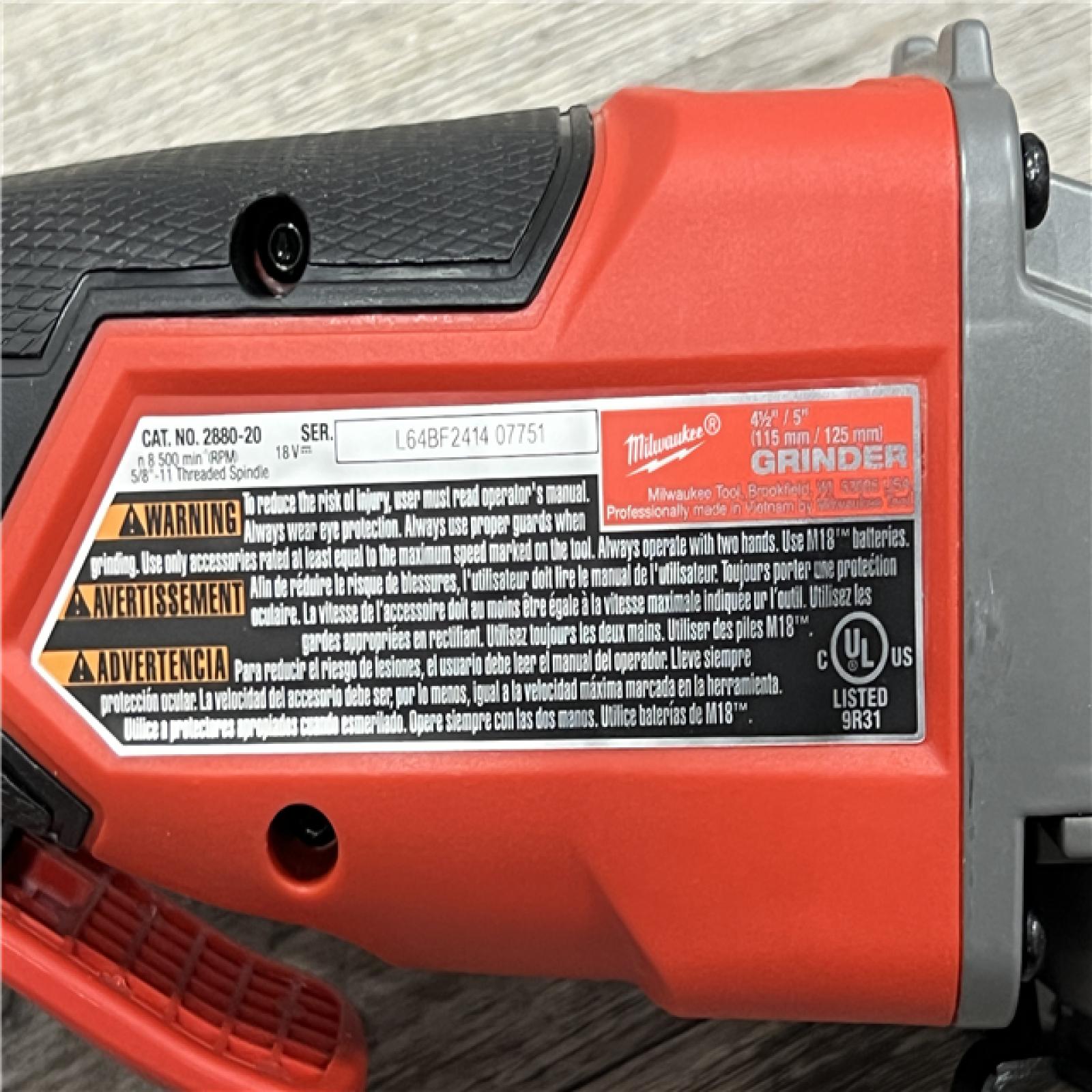 AS-IS Milwaukee 2880-20 M18 FUEL 18-Volt Lithium-Ion Brushless Cordless 4-1/2 in./5 in. Grinder W/Paddle Switch (Tool-Only)