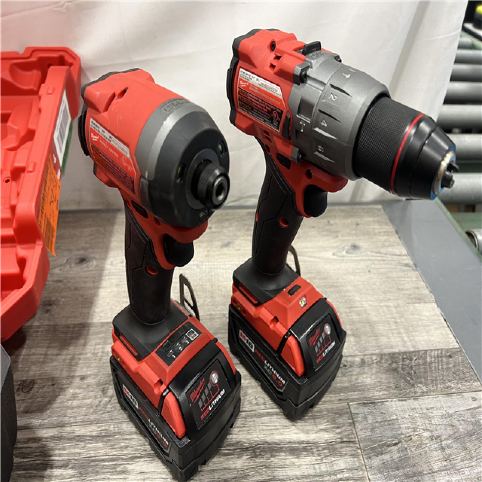 AS-IS MILWAUKEE M18 FUEL 18V Lithium-Ion Brushless Cordless Hammer Drill and Impact Driver Combo Kit (2-Tool) with 2 Batteries