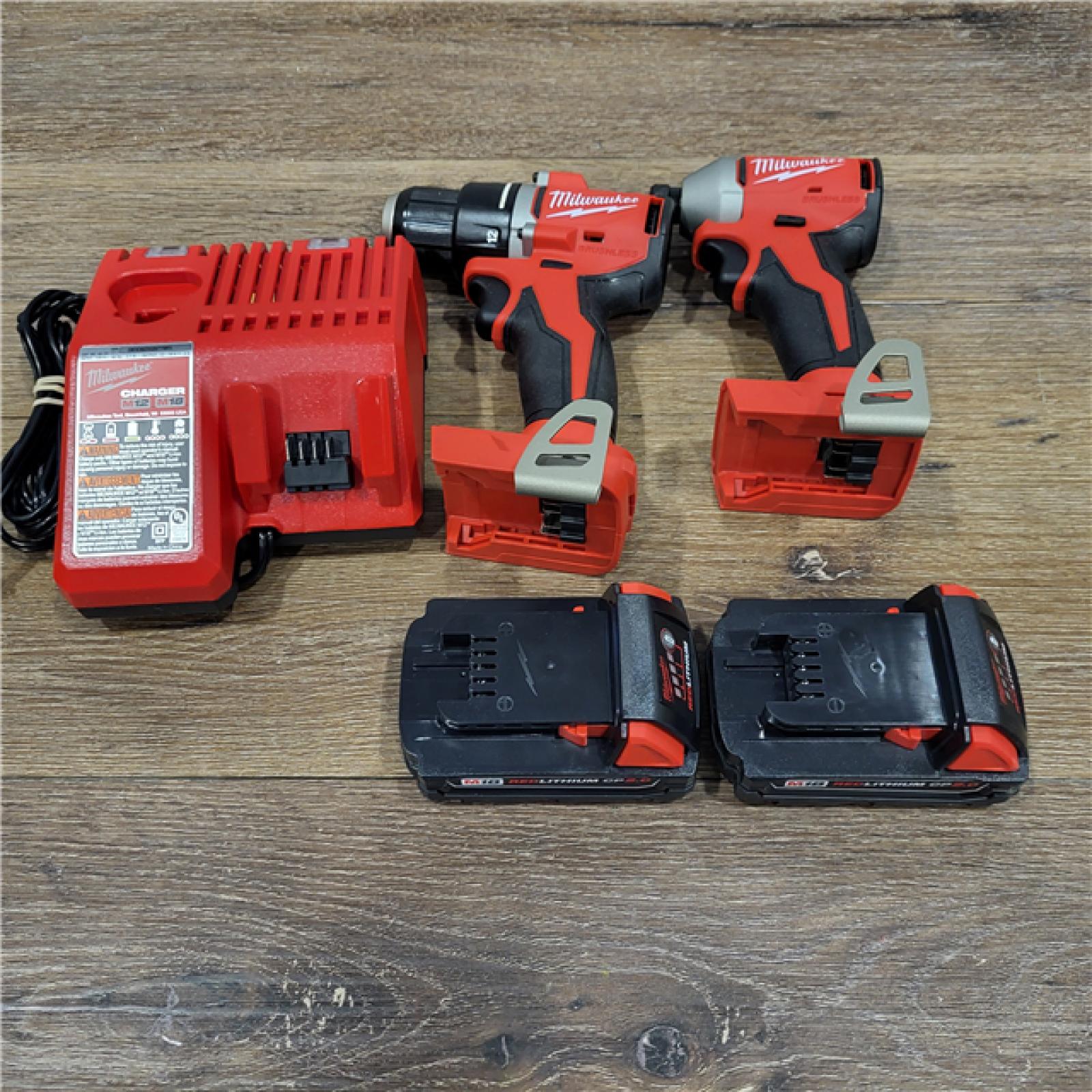 AS-IS M18 18V Lithium-Ion Brushless Cordless Compact Drill/Impact Combo Kit (2-Tool) W/(2) 2.0 Ah Batteries, Charger & Bag