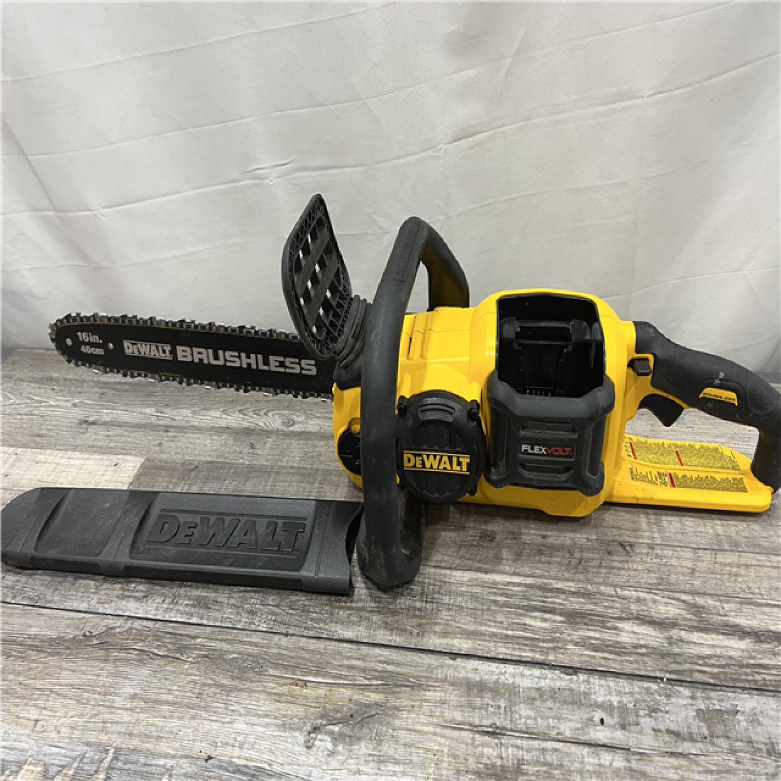 AS-IS DEWALT  FLEXVOLT 60V MAX 16in. Brushless Cordless Battery Powered Chainsaw Kit with (1) FLEXVOLT 2 Ah Battery & Charger