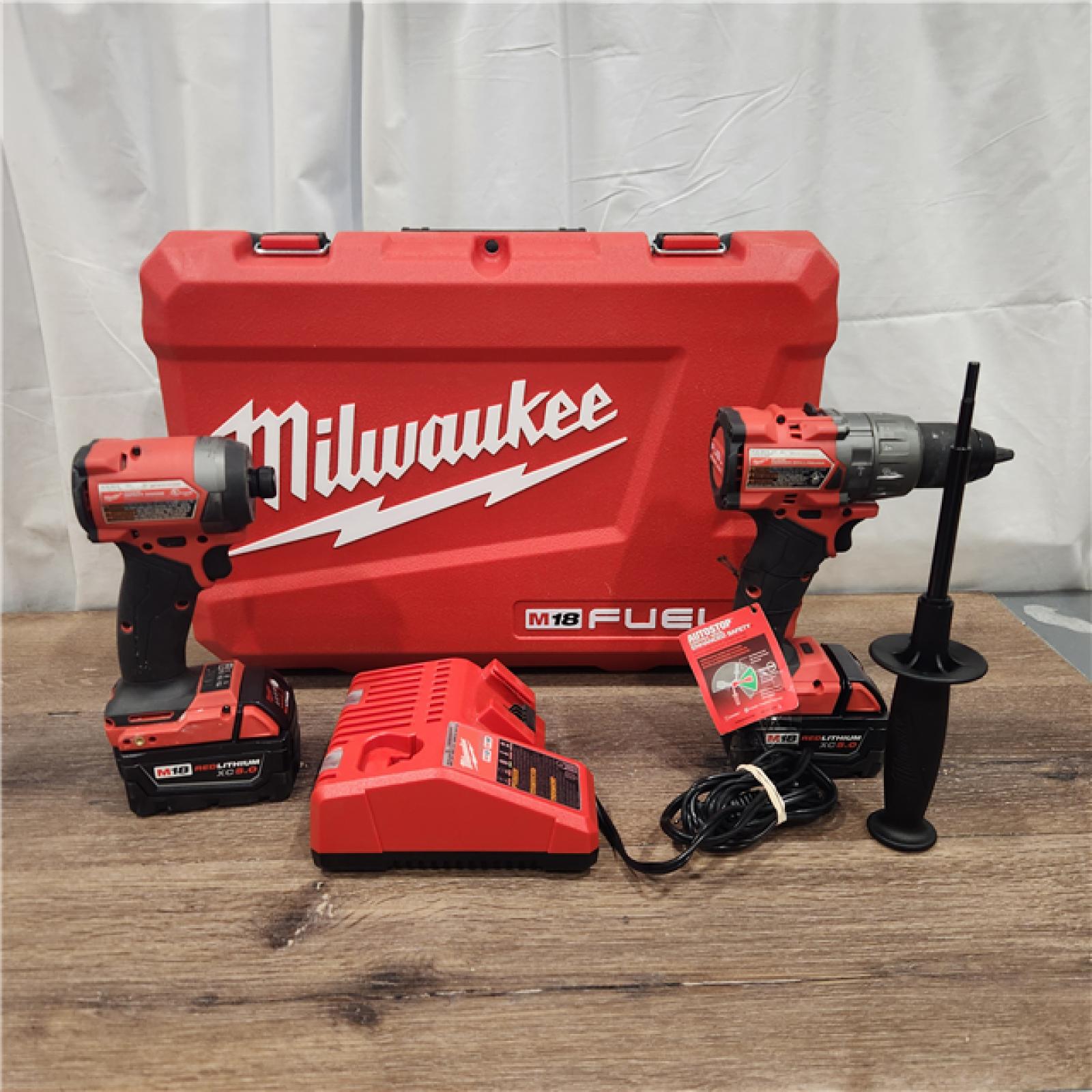 AS IS Milwaukee M18 FUEL 18V Lithium-Ion Brushless Cordless Hammer Drill and Impact Driver Combo Kit (2-Tool) with 2 Batteries